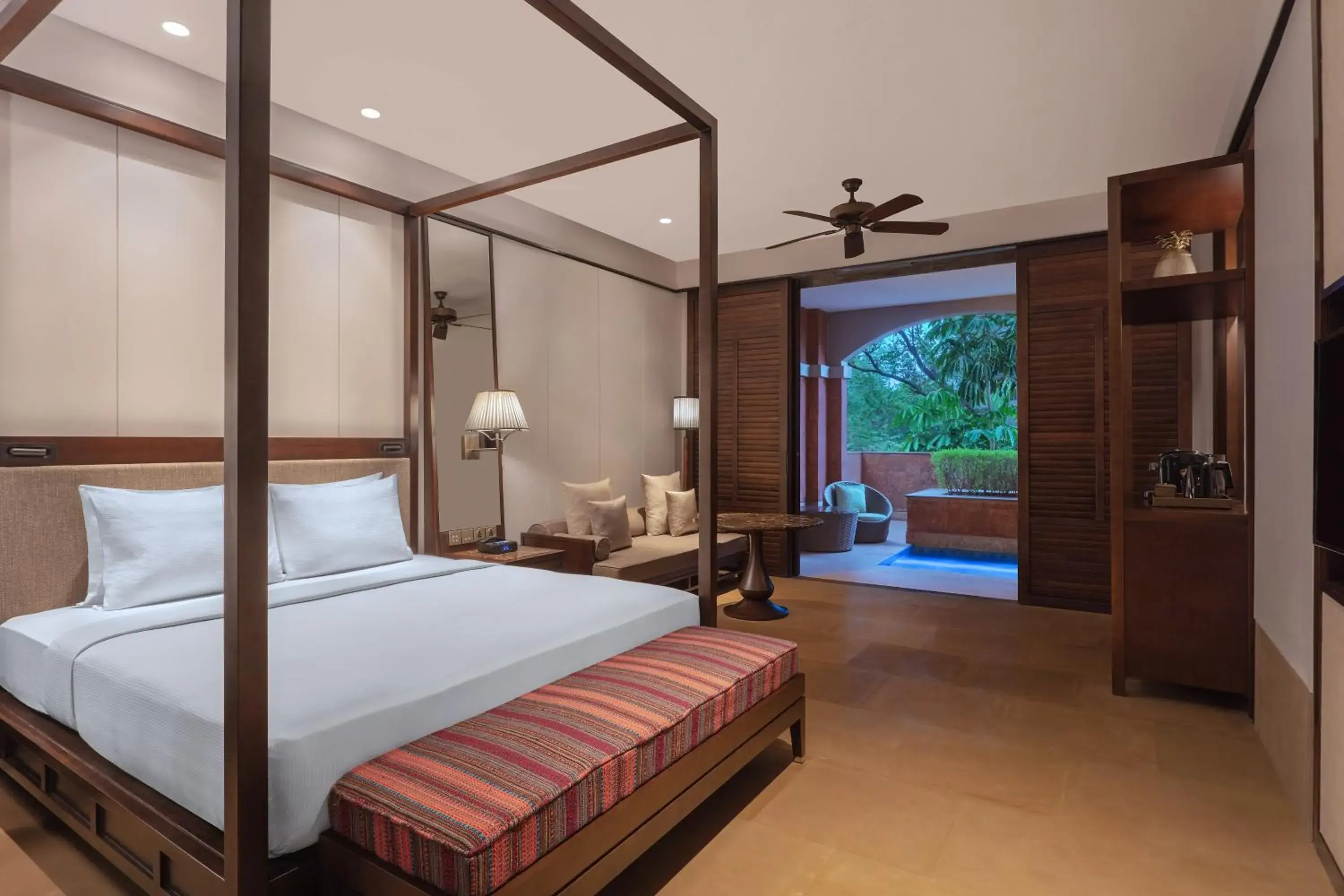 Swimming pool, Bed in Hilton Goa Resort Candolim Swimming pool, Bed in Hilton Goa Resort Candolim