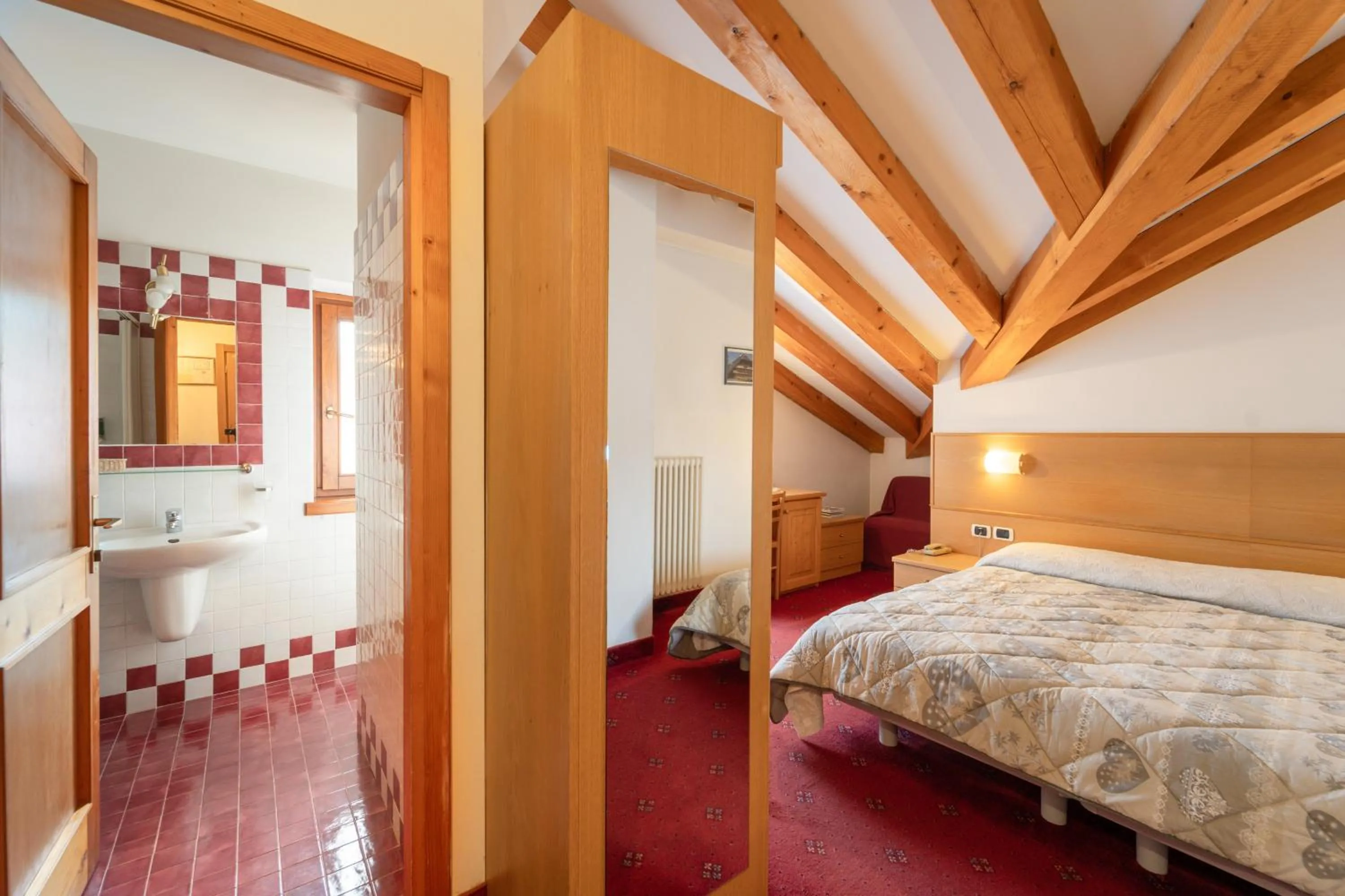Bed in Hotel Orso Grigio
