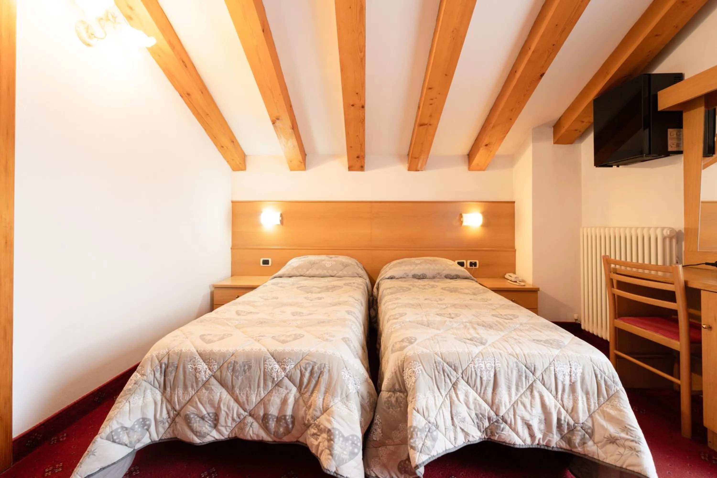 Bed in Hotel Orso Grigio