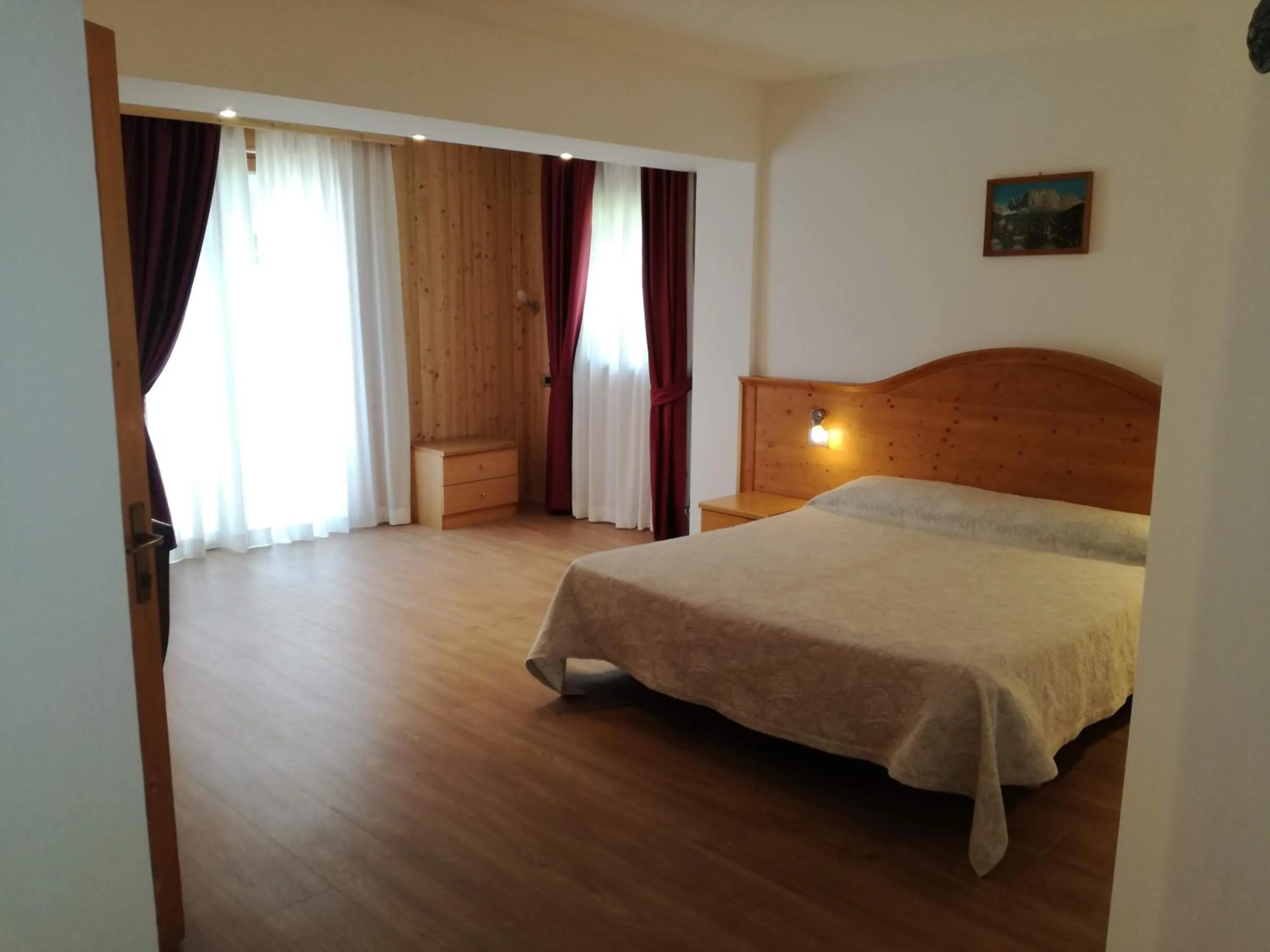 Bed in Hotel Orso Grigio