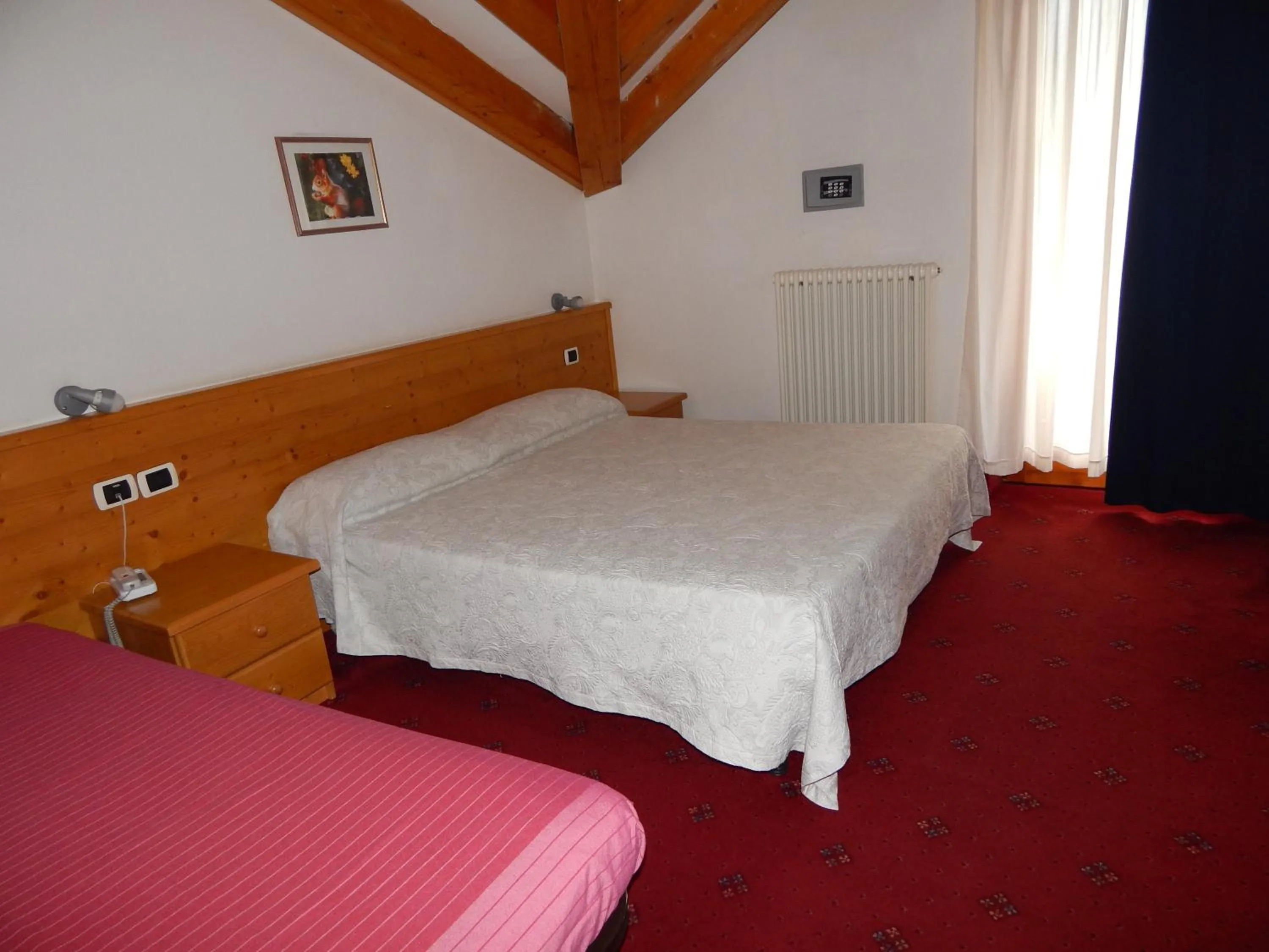 Bed in Hotel Orso Grigio