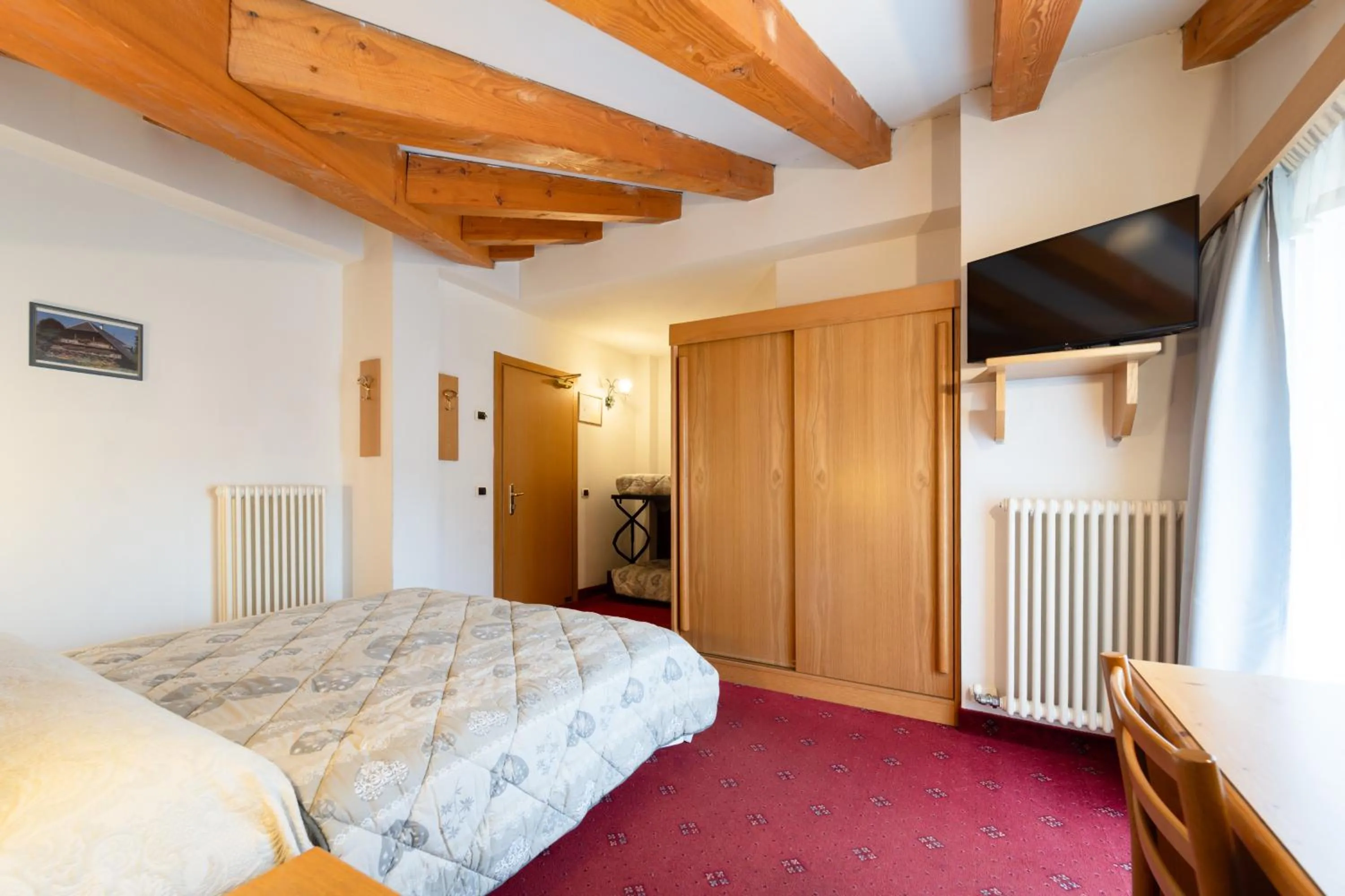 Bed in Hotel Orso Grigio