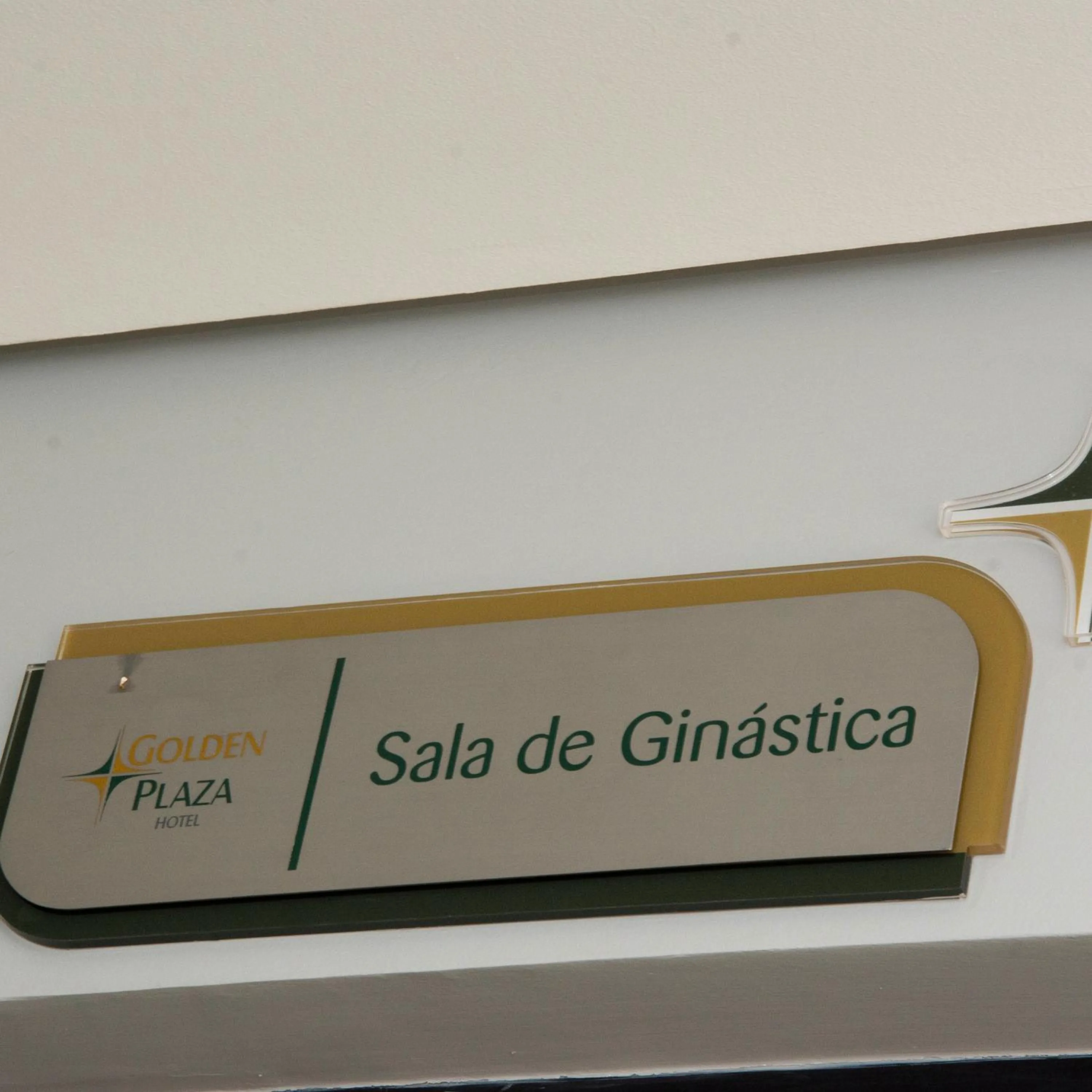 Property logo or sign in Golden Plaza Hotel