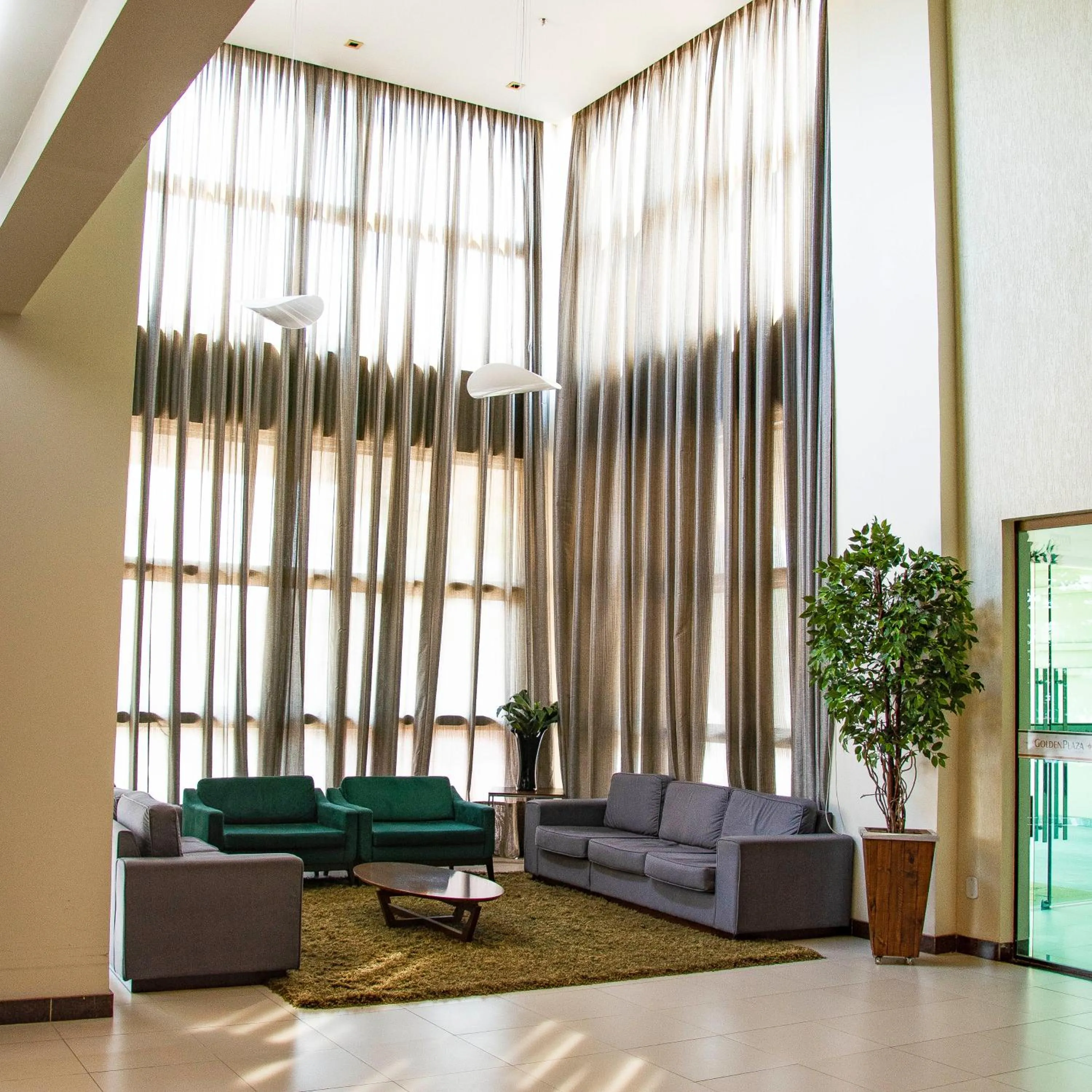 Communal lounge/ TV room in Golden Plaza Hotel