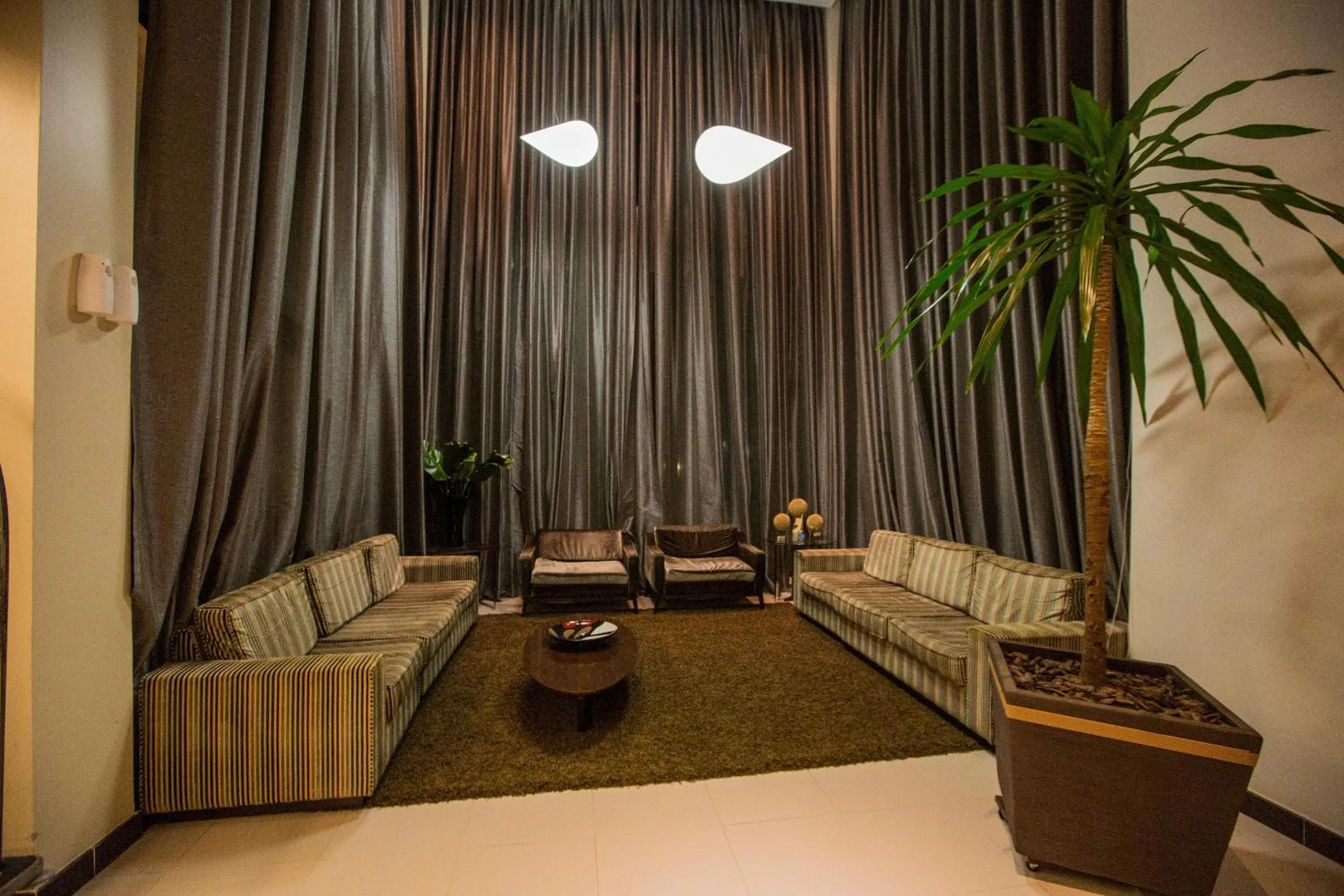 Living room in Golden Plaza Hotel