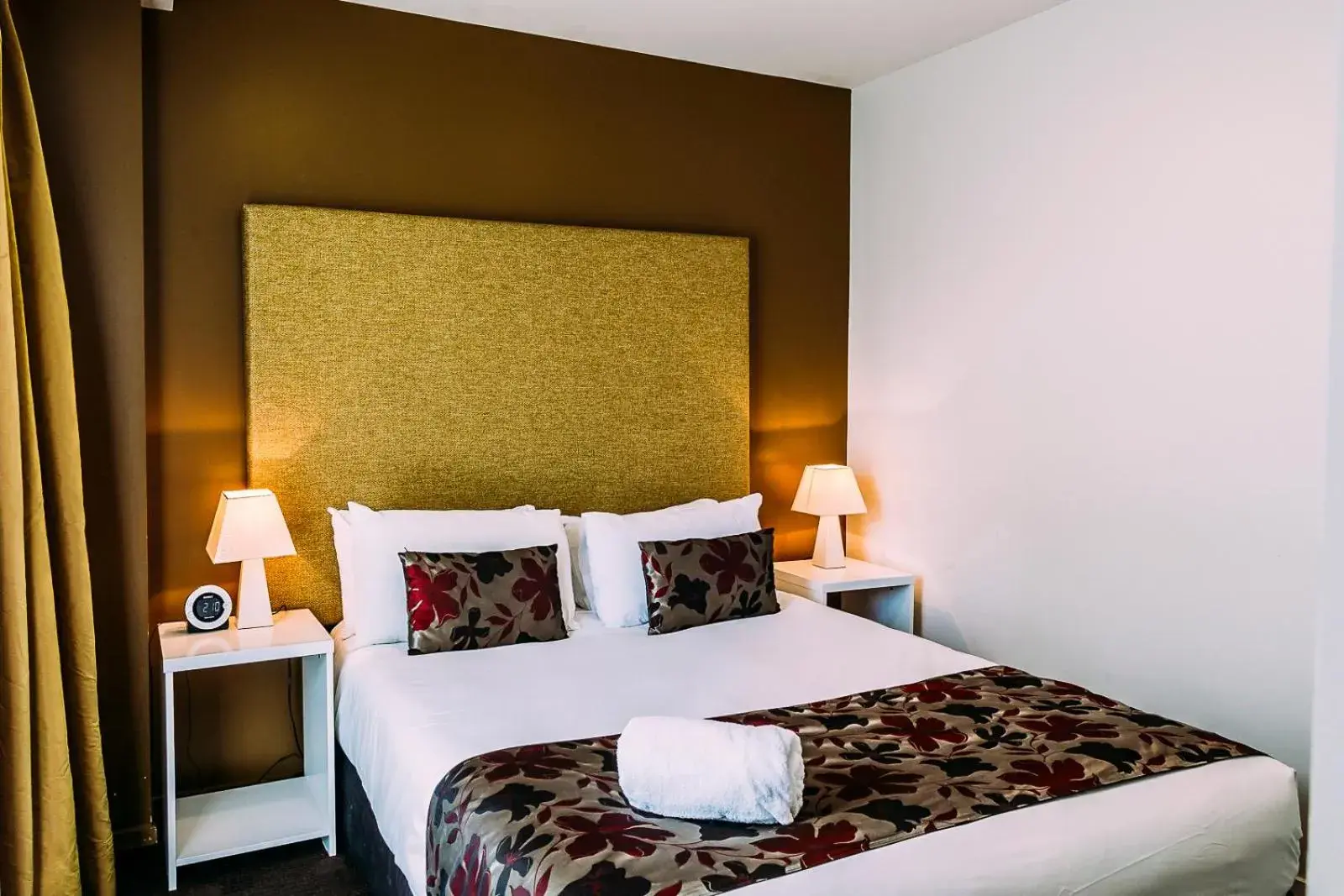 Bed in The Quadrant Hotel & Suites Bed in The Quadrant Hotel & Suites