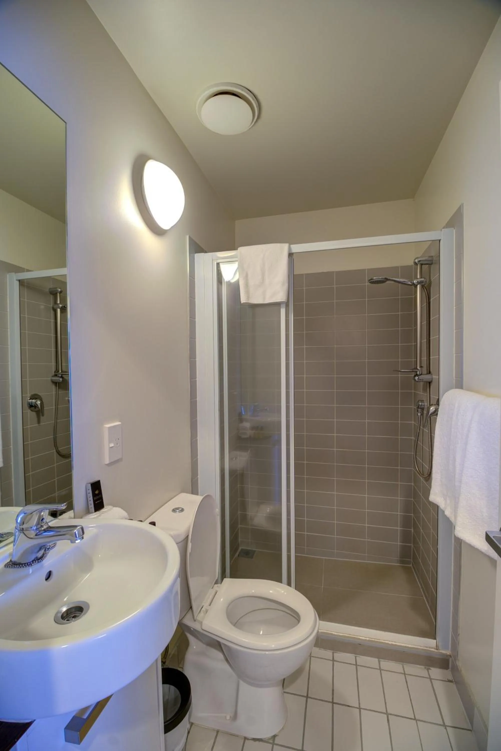 Shower in The Quadrant Hotel & Suites