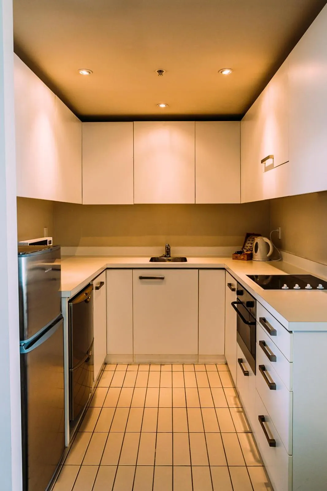 Kitchen or kitchenette in The Quadrant Hotel & Suites