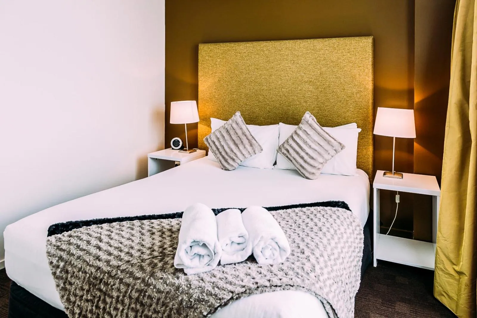 Bed in The Quadrant Hotel & Suites