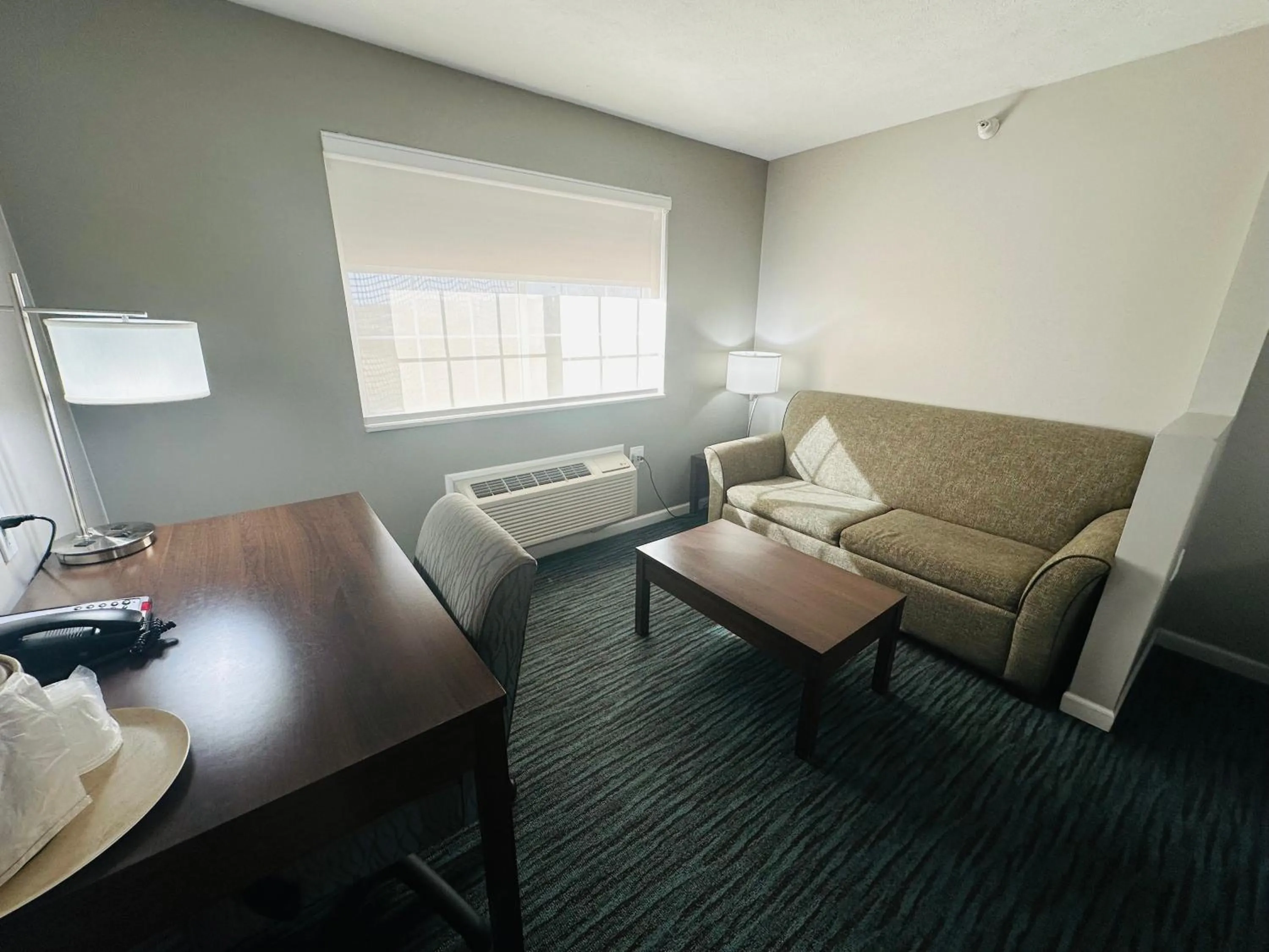 Seating area in BridgePointe Inn & Suites by BPhotels, Lincoln I-80 & 27th St