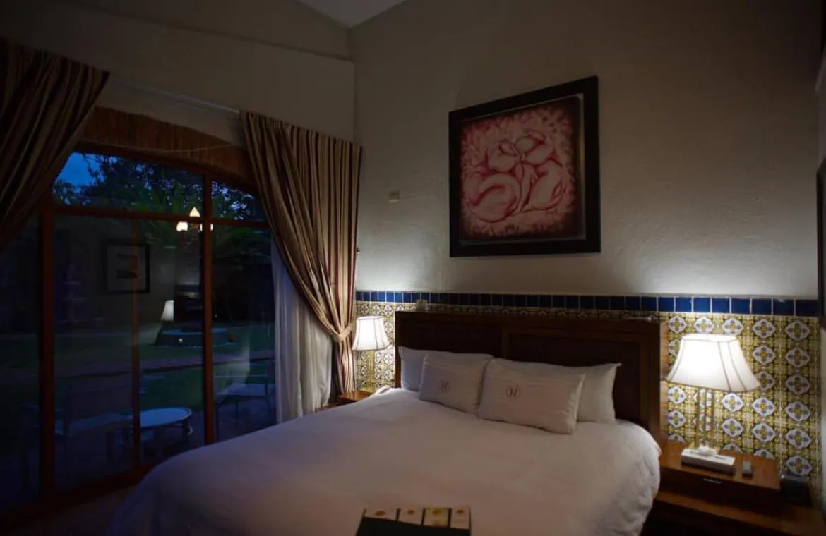 Bed in Hacienda del Lago Boutique Hotel
