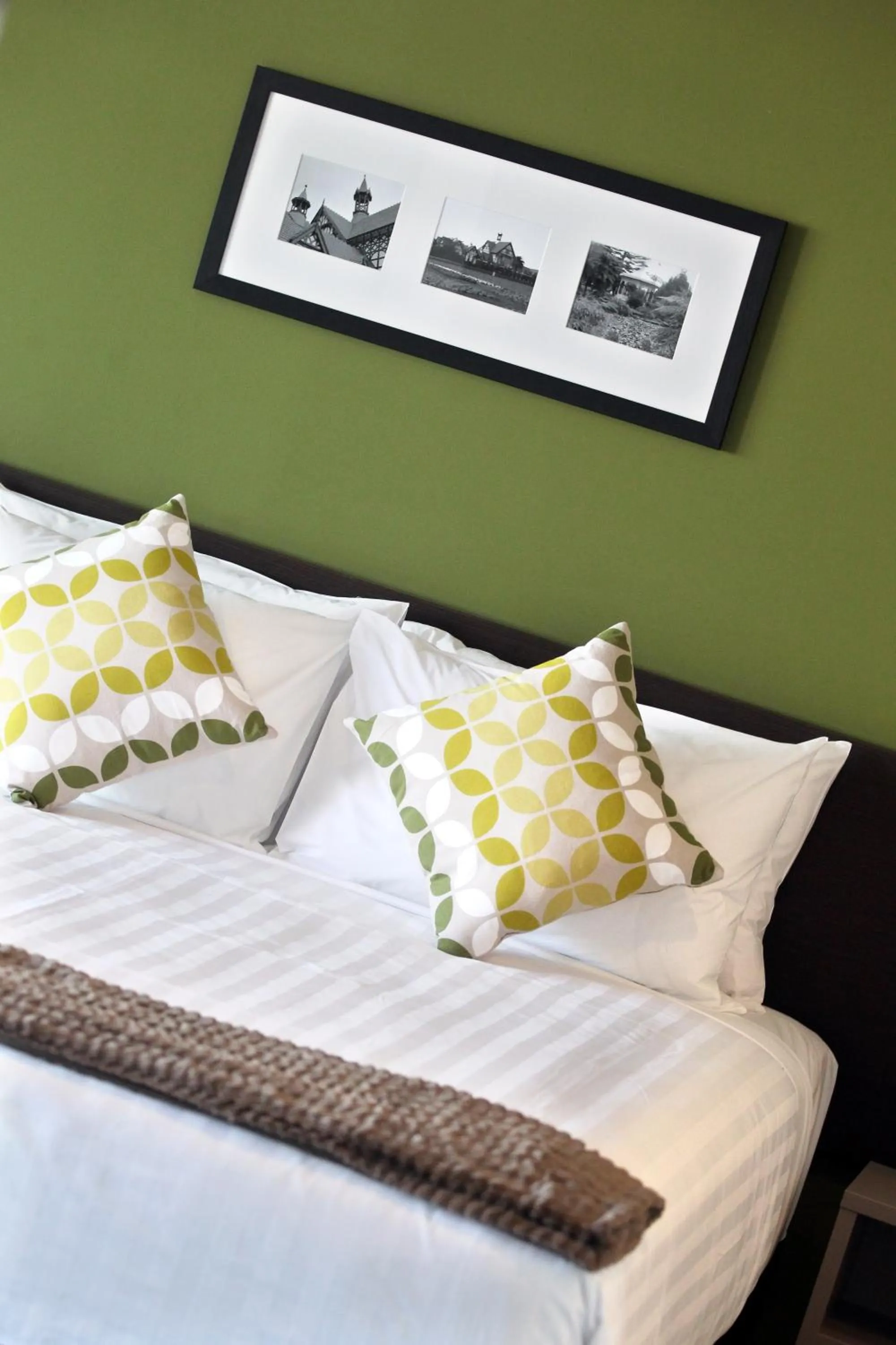 Living room, Bed in Quest Rotorua Central