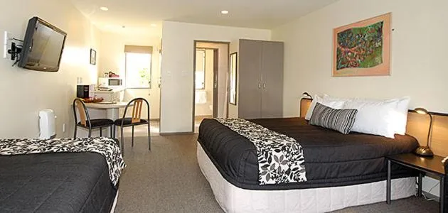 Bed in Pavilions Hotel