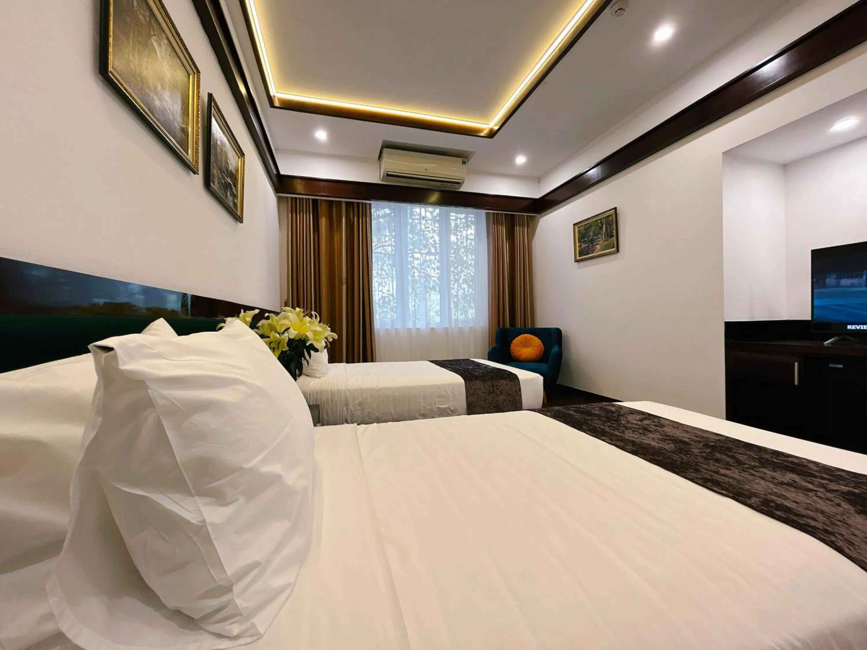 Photo of the whole room, Bed in Mango Hotel - Ha Noi Railway station