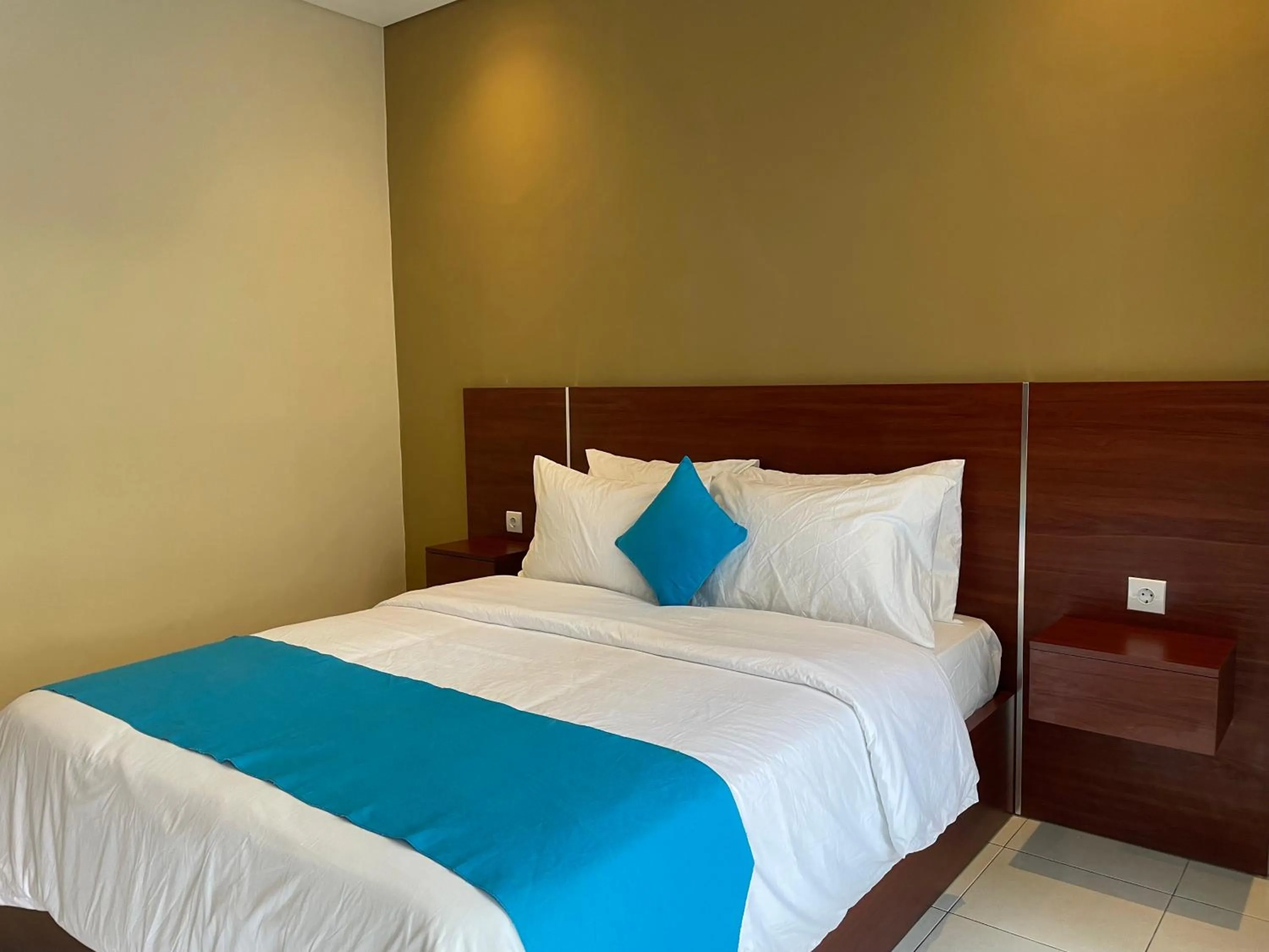 Bed in Seminyak Point Guest House