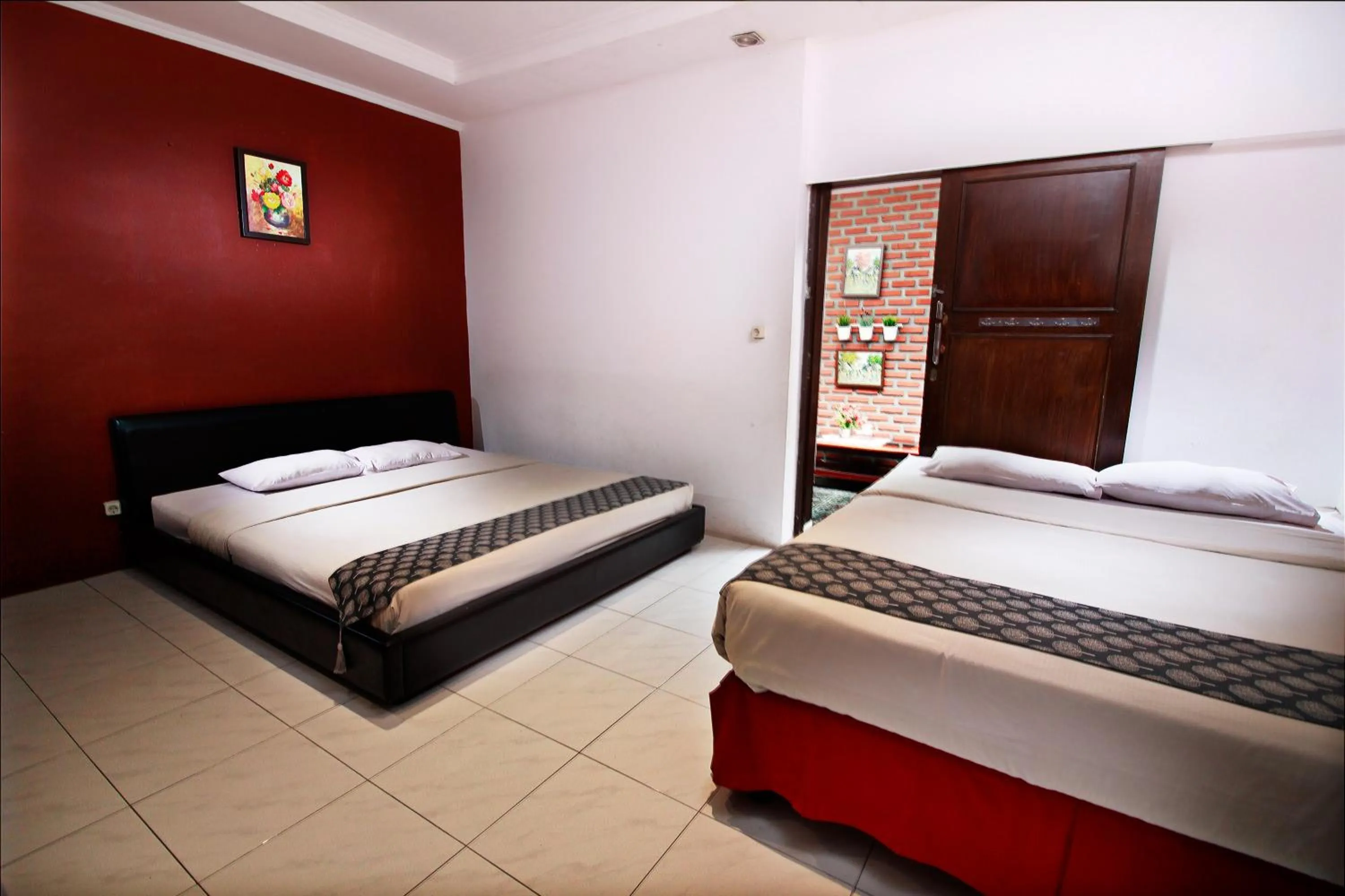 Bed in Fora Guest House Taman Lingkar