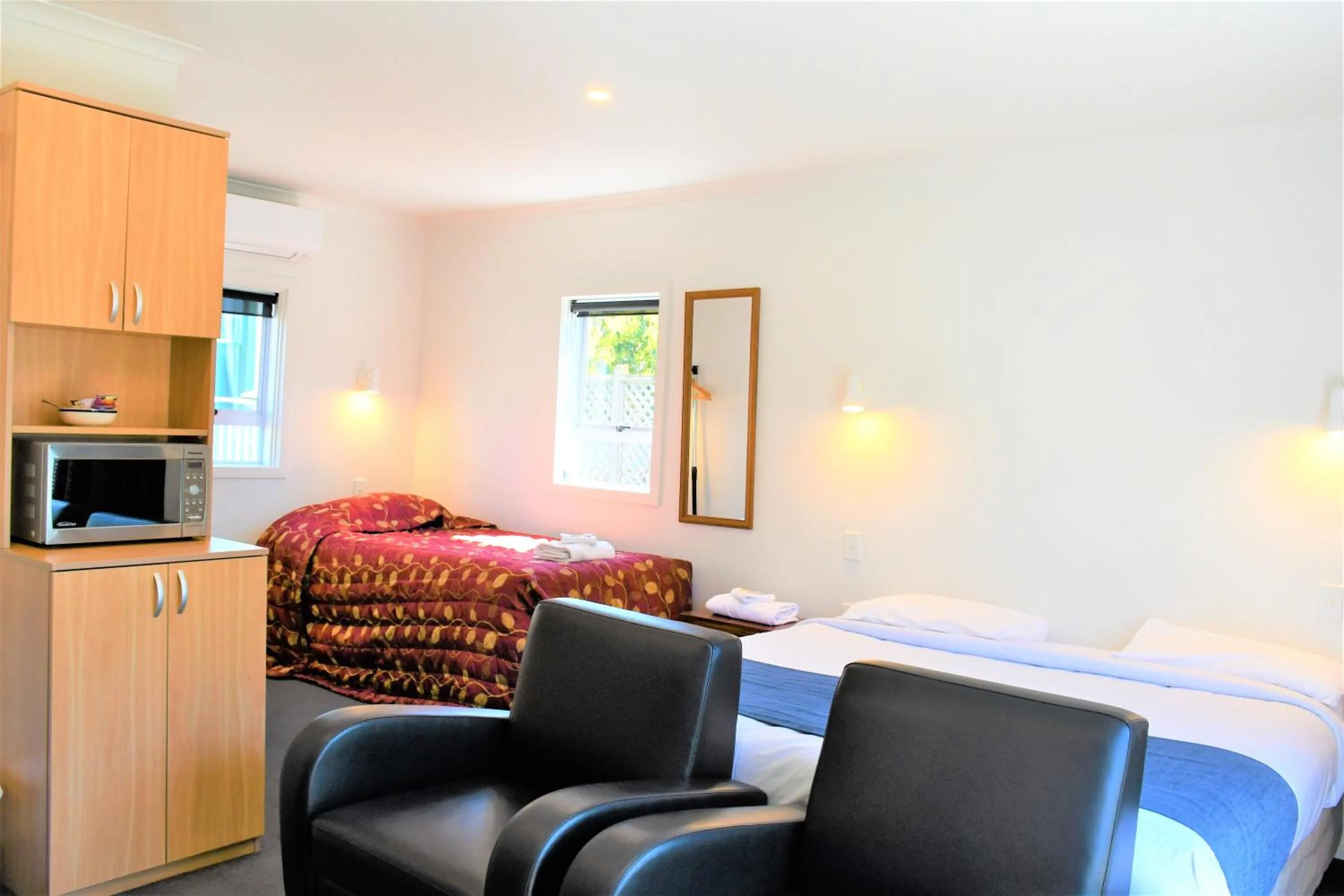 Bed in Comfort Inn Westshore Beach