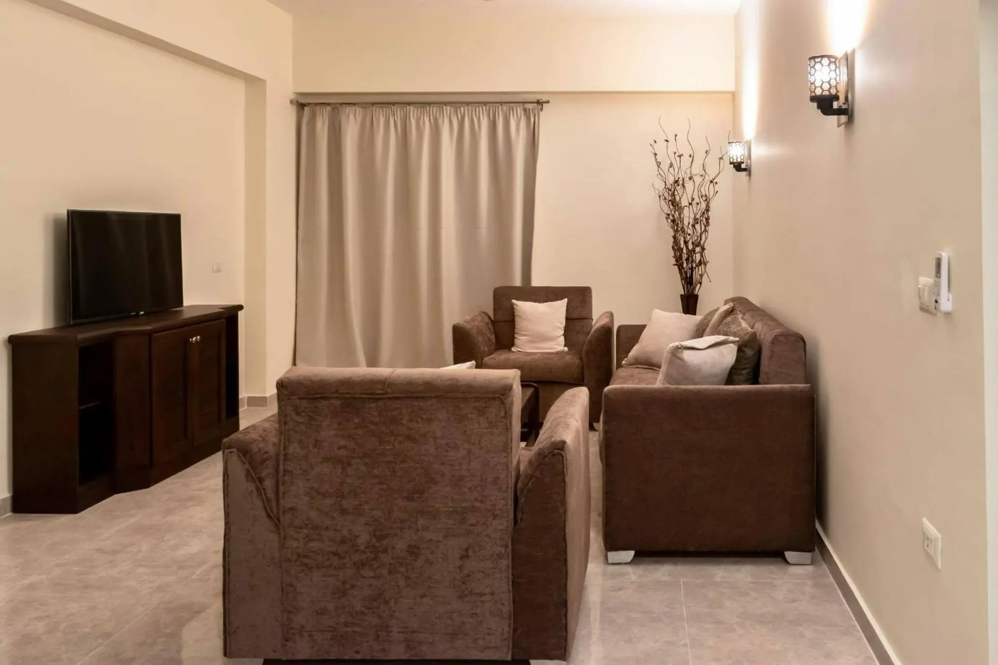 Communal lounge/ TV room in Bahga Palace 1 Residential Apartments