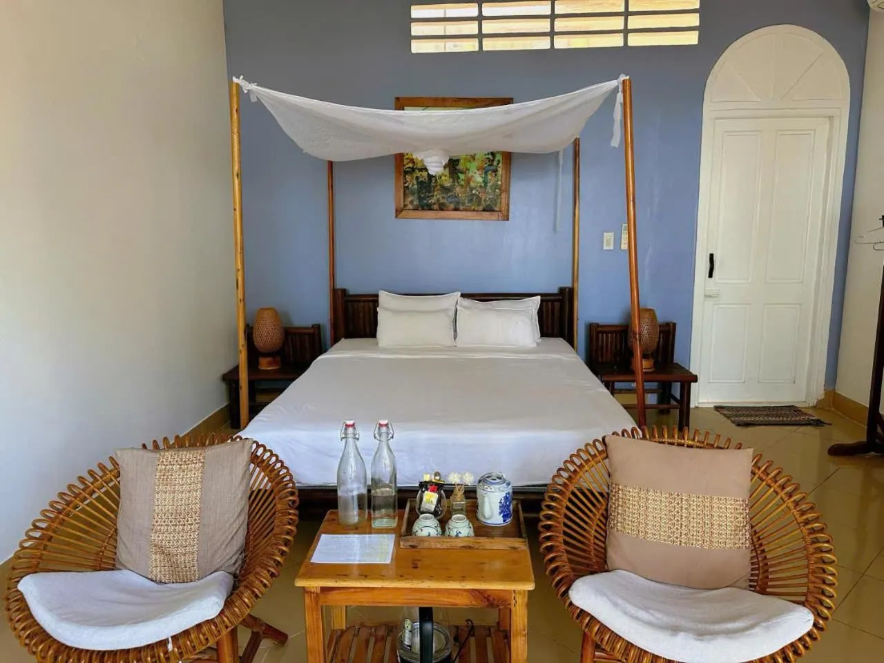 Bed in Bamboo Cottages