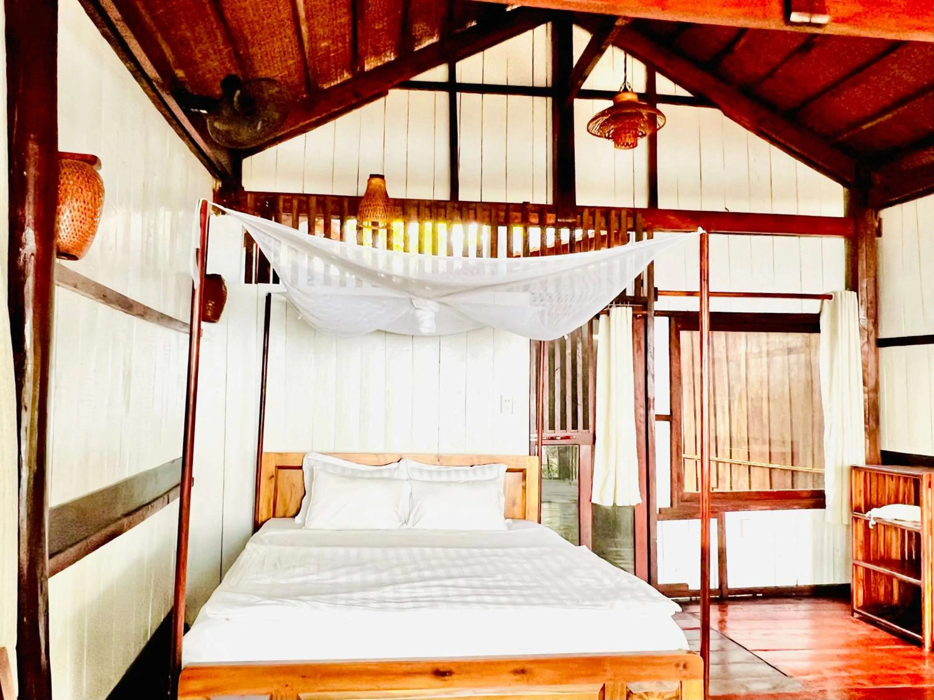 Bed in Bamboo Cottages