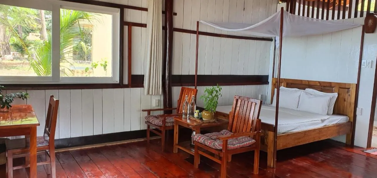 Bed in Bamboo Cottages