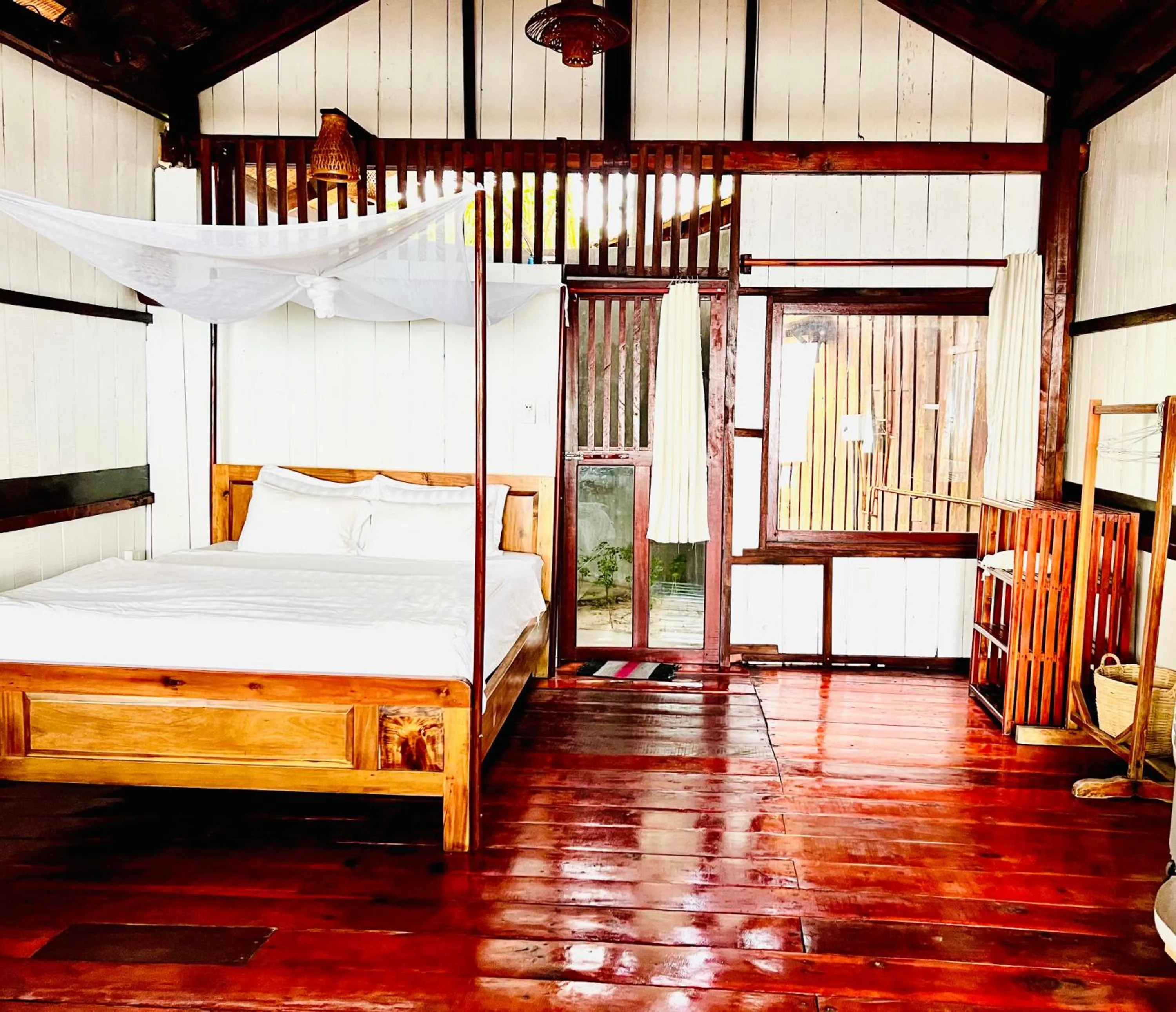 Bed in Bamboo Cottages