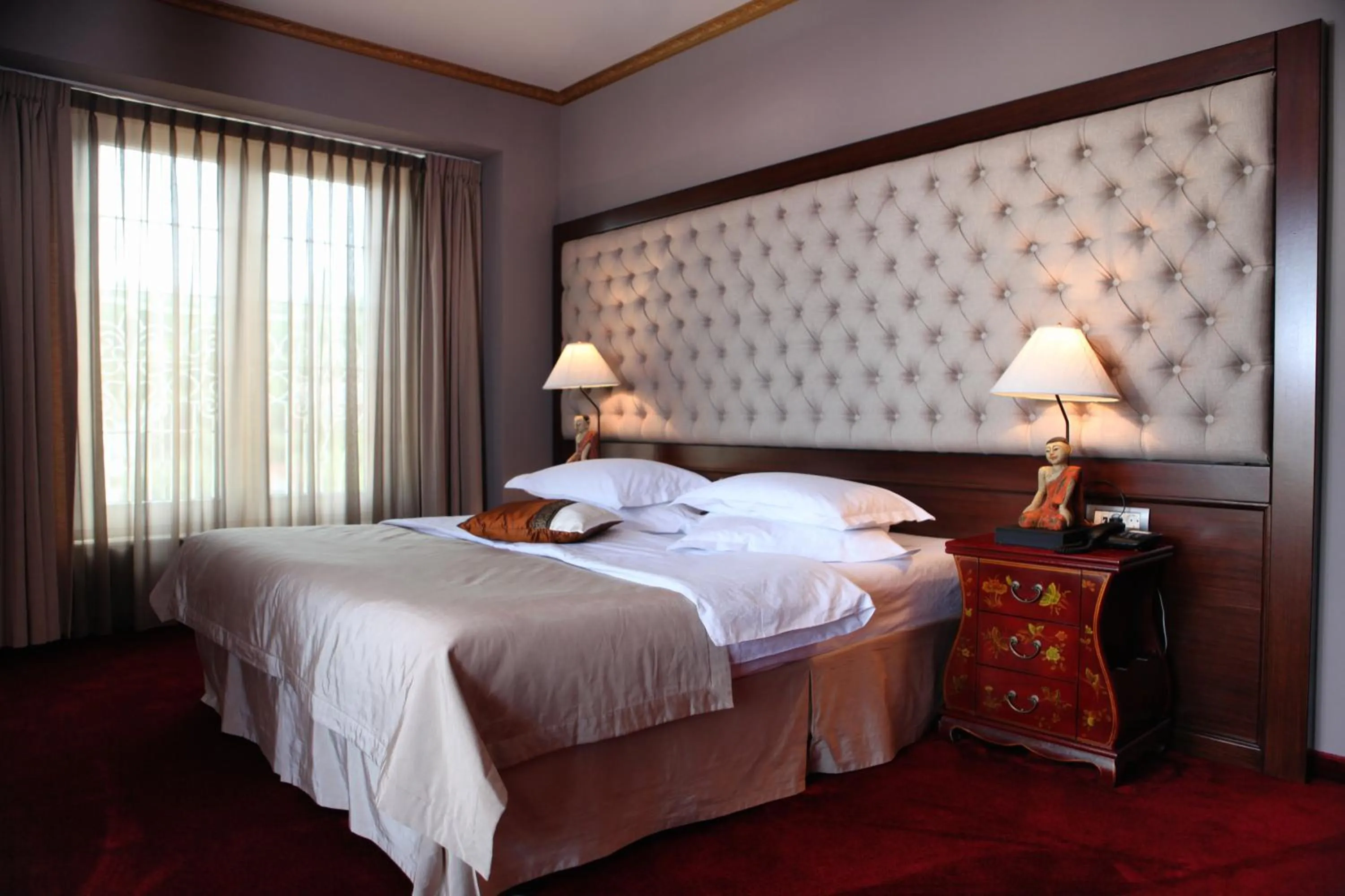 Bed in Simfonia Boutique Hotel
