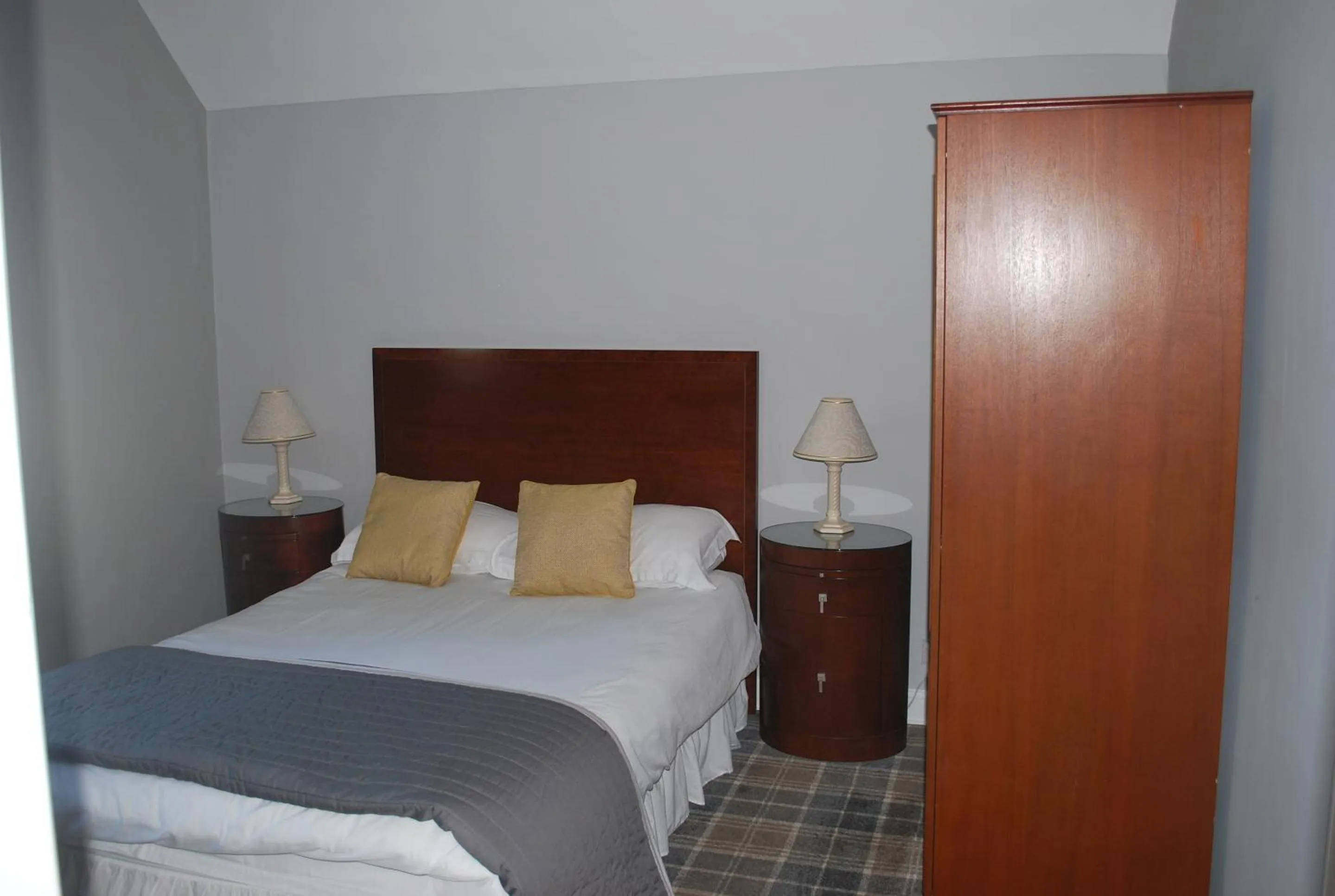Bedroom, Bed in OYO Dunmar House Hotel