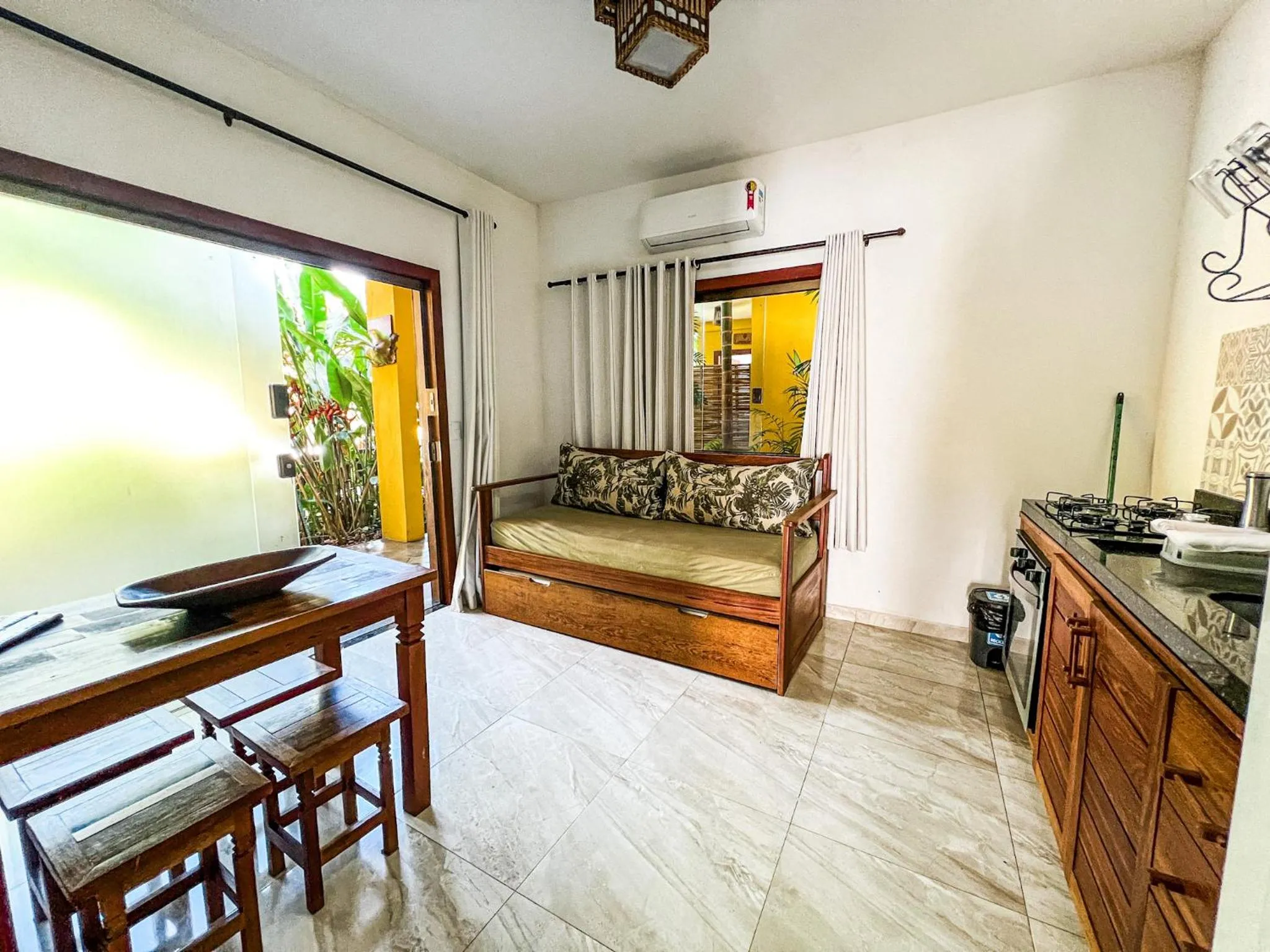 Kitchen or kitchenette in Conchas do Mar Residence