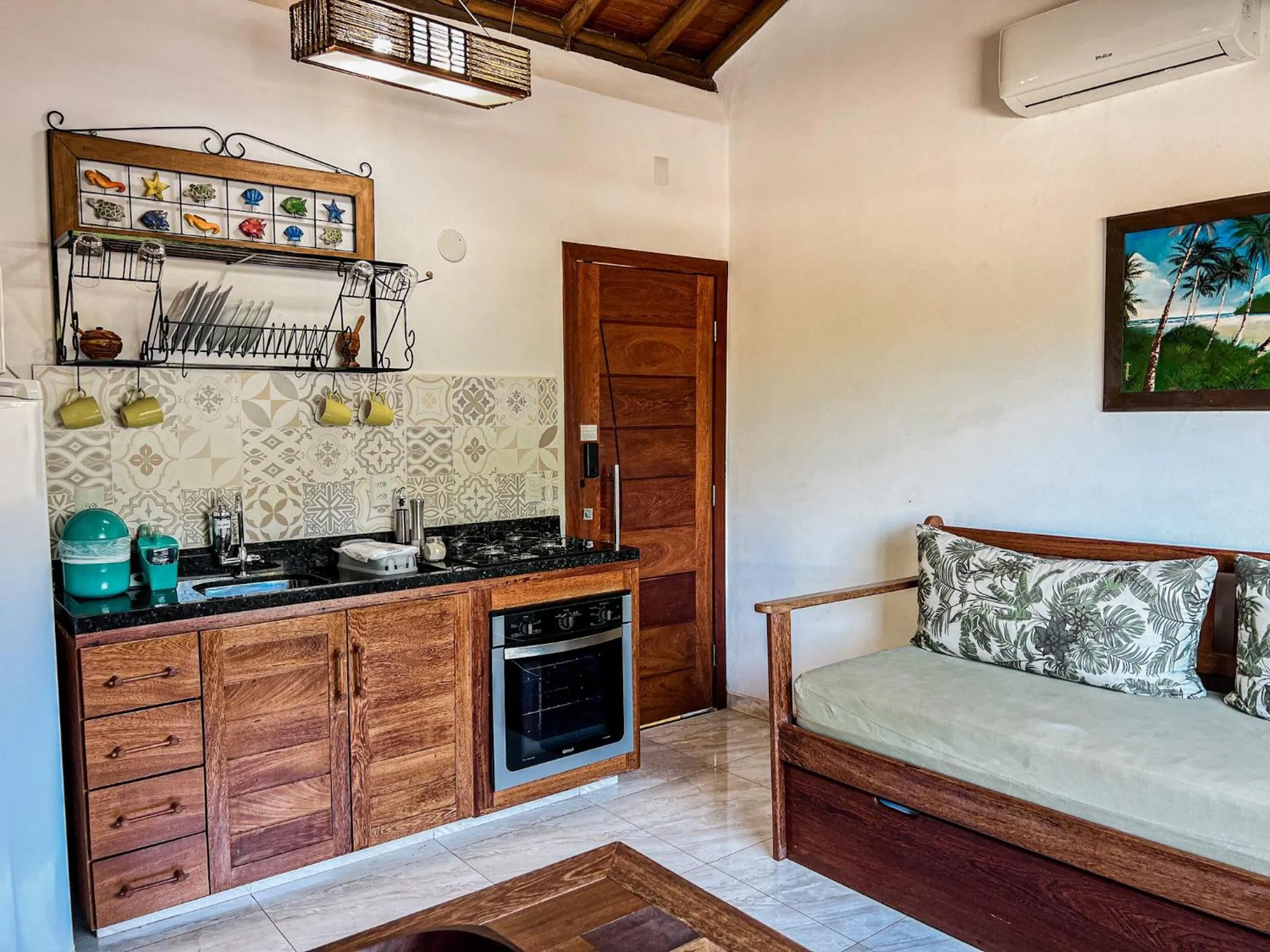 Kitchen or kitchenette in Conchas do Mar Residence