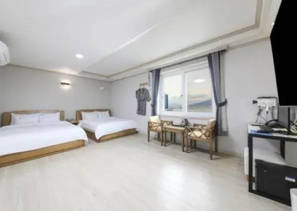 Bed in Mj Hotel Bed in Mj Hotel