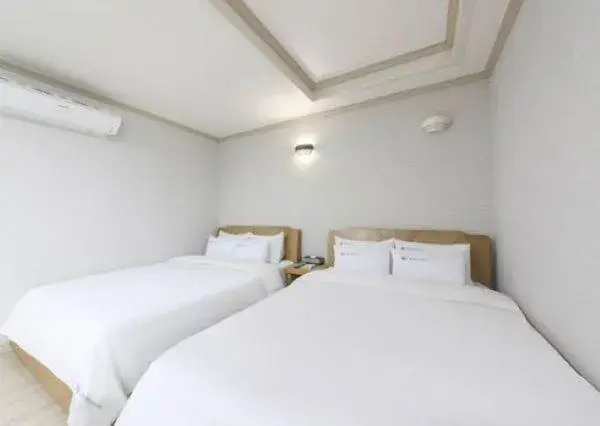 Bed in Mj Hotel Bed in Mj Hotel