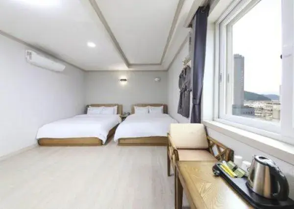 Bed in Mj Hotel Bed in Mj Hotel