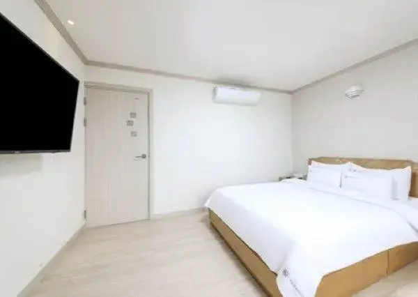 Bed in Mj Hotel Bed in Mj Hotel