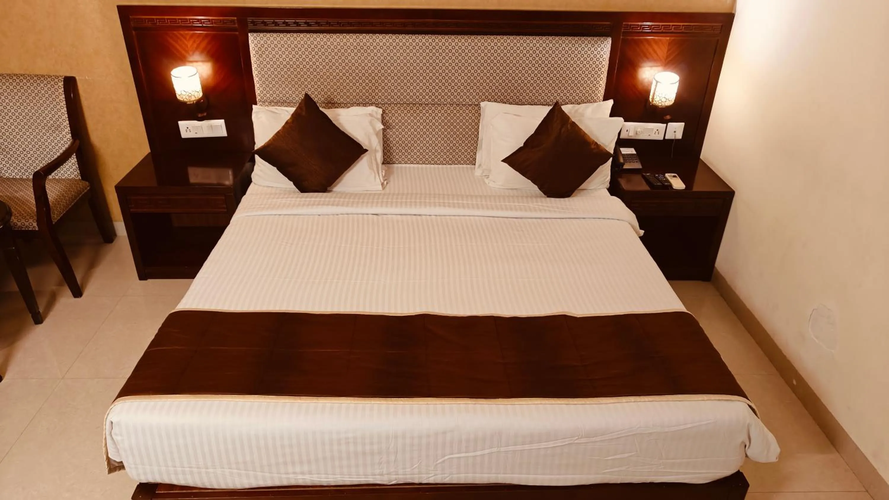 Bed in Alps Residency - A Bergamont Hotel, Krishnagiri