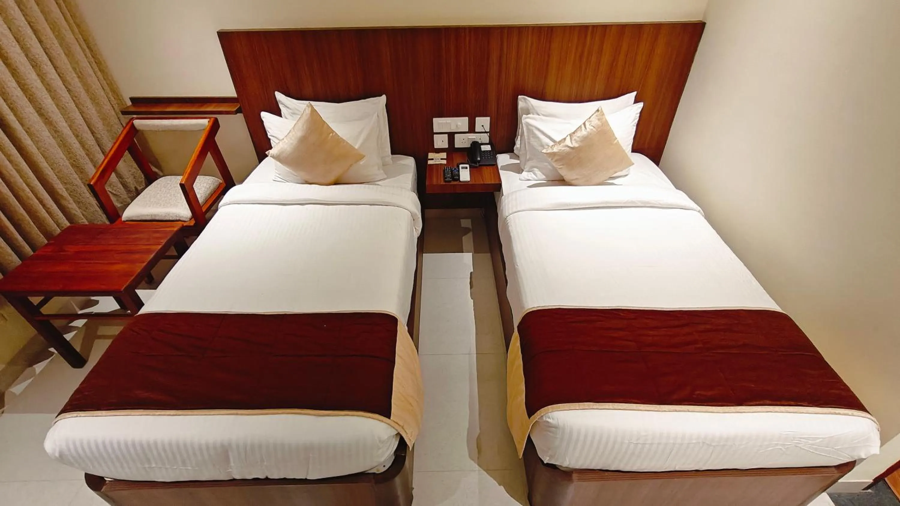 Bed in Alps Residency - A Bergamont Hotel, Krishnagiri