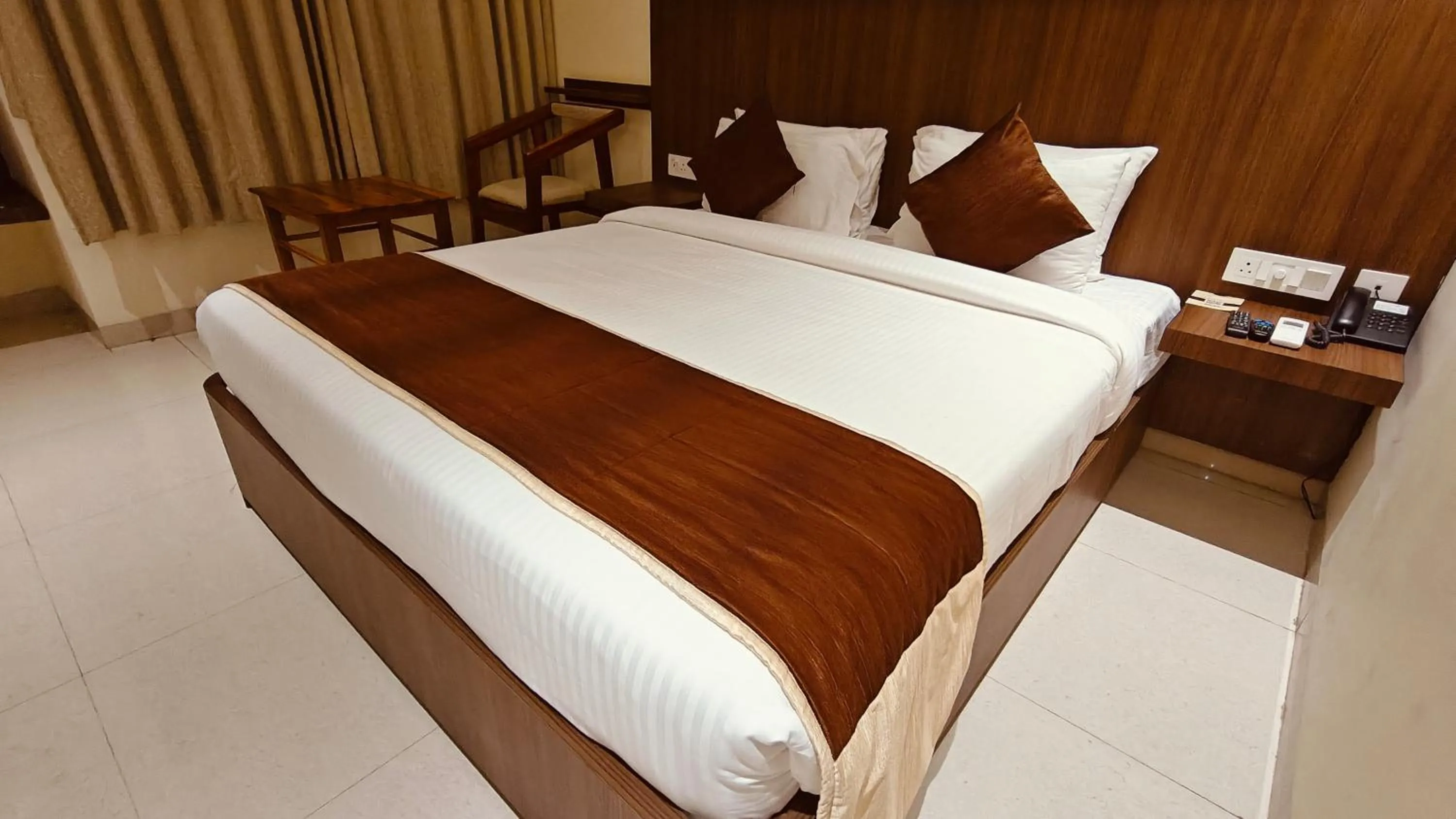 Bed in Alps Residency - A Bergamont Hotel, Krishnagiri