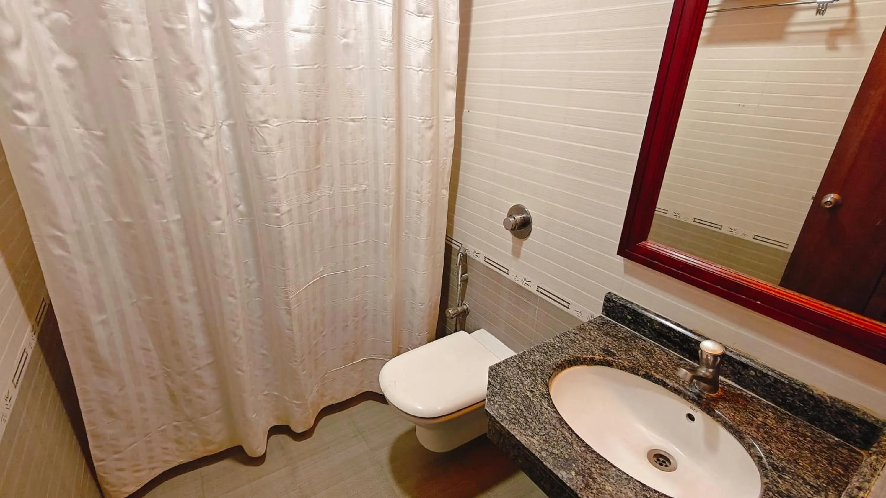 Toilet in Alps Residency - A Bergamont Hotel, Krishnagiri