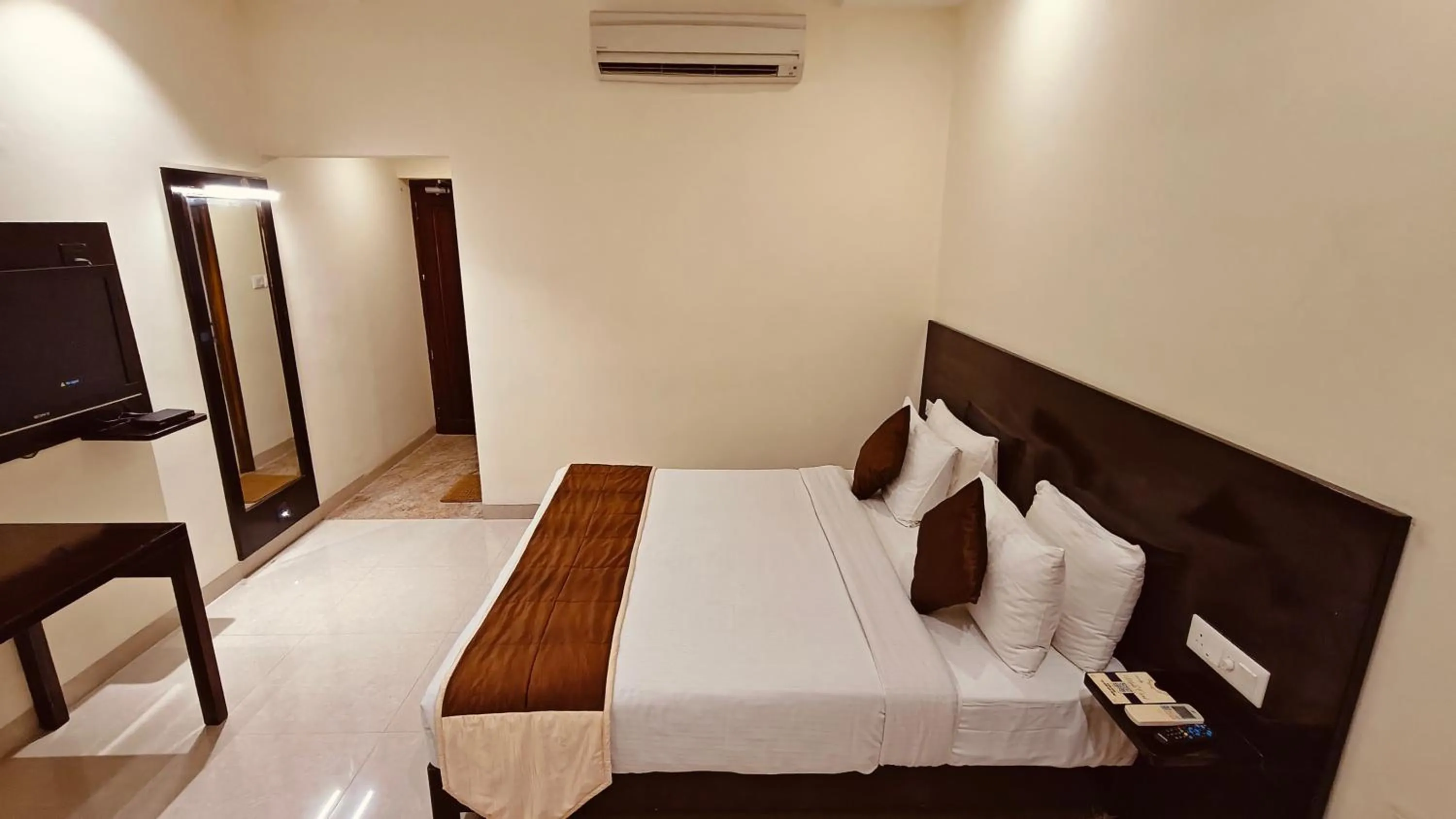 Bed in Alps Residency - A Bergamont Hotel, Krishnagiri