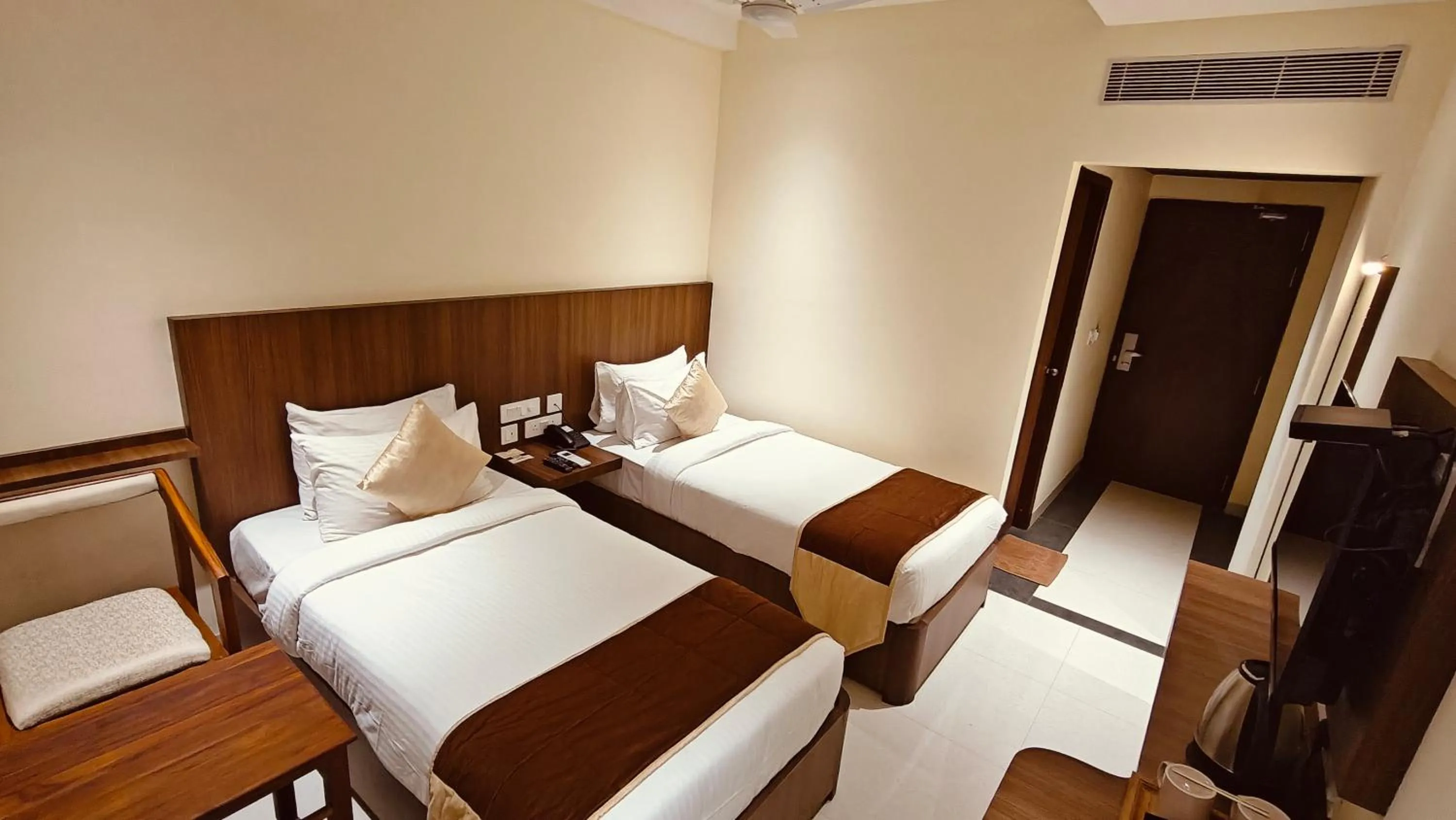 Bed in Alps Residency - A Bergamont Hotel, Krishnagiri