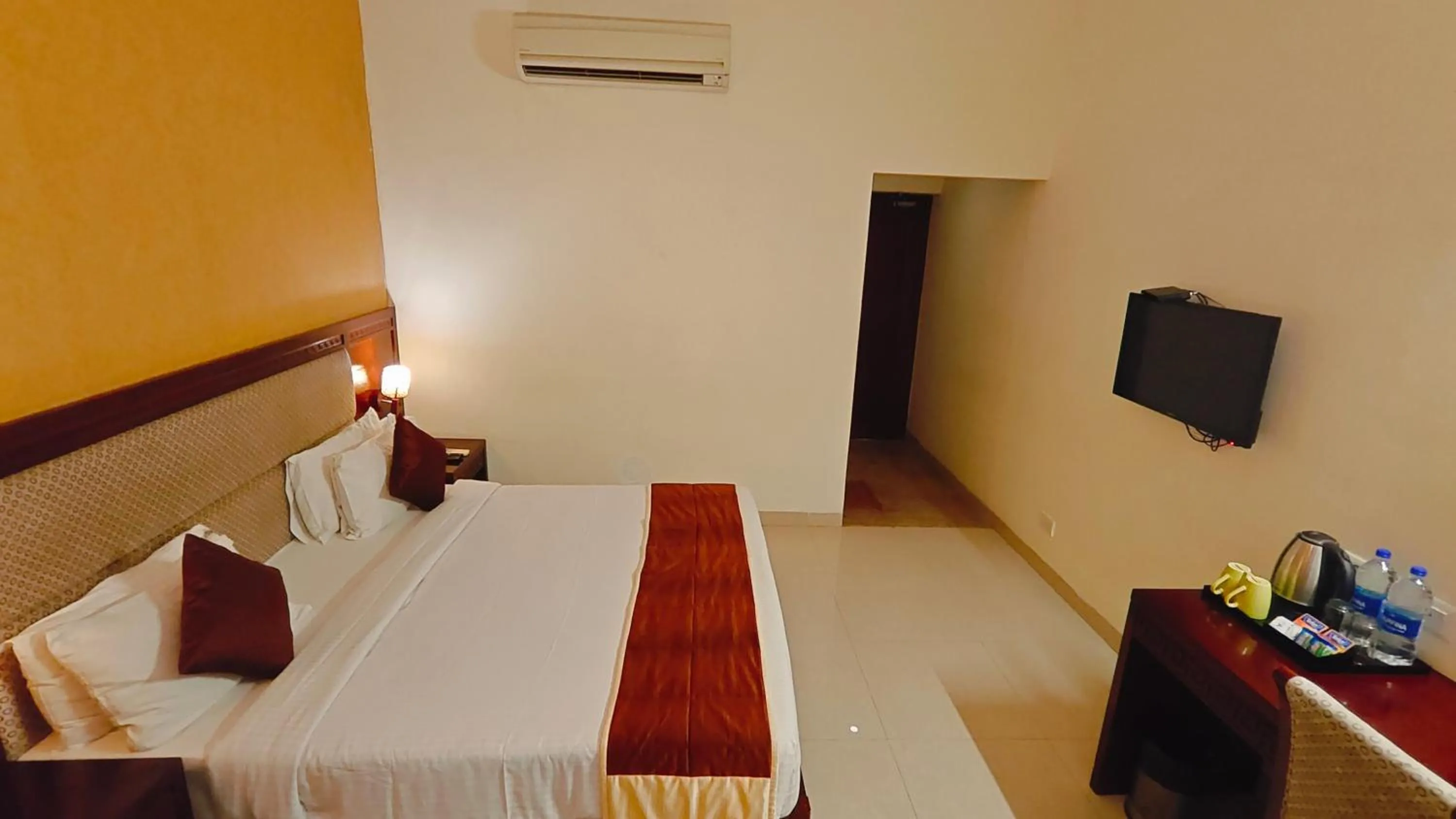 Bed in Alps Residency - A Bergamont Hotel, Krishnagiri