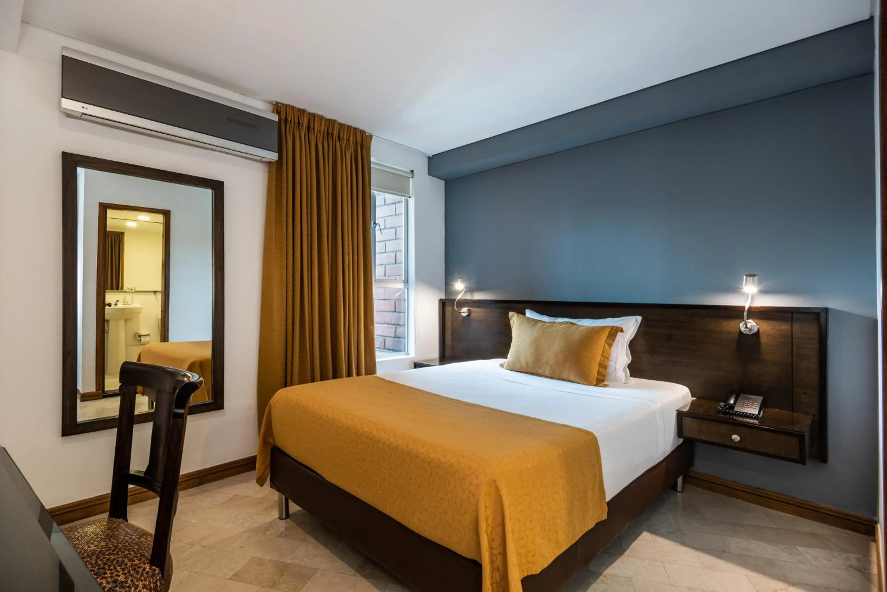 Property building, Bed in Hotel Egina Medellin