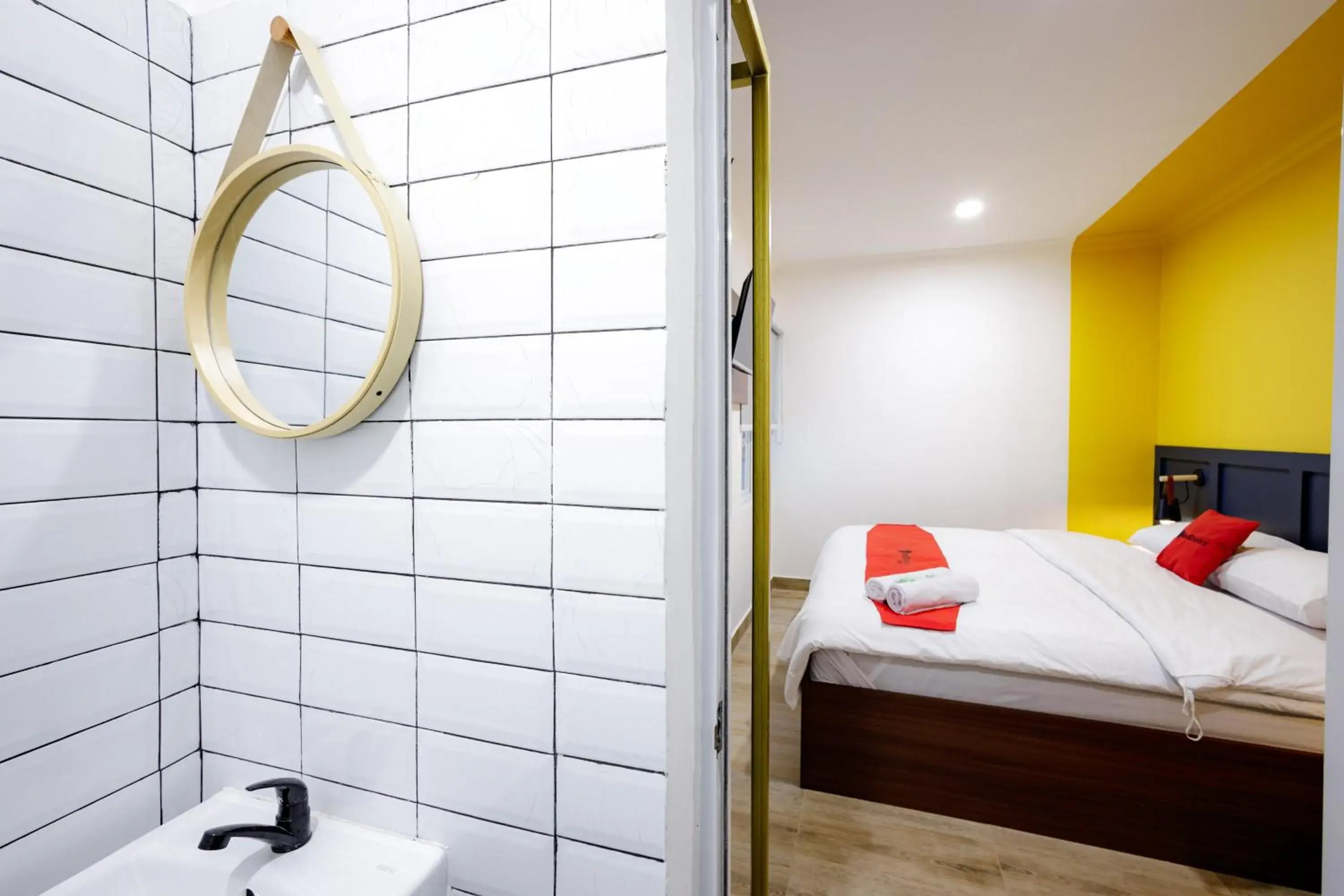 Bed in RedDoorz Plus at Jalan Gatot Subroto Jakarta Bed in RedDoorz Plus at Jalan Gatot Subroto Jakarta