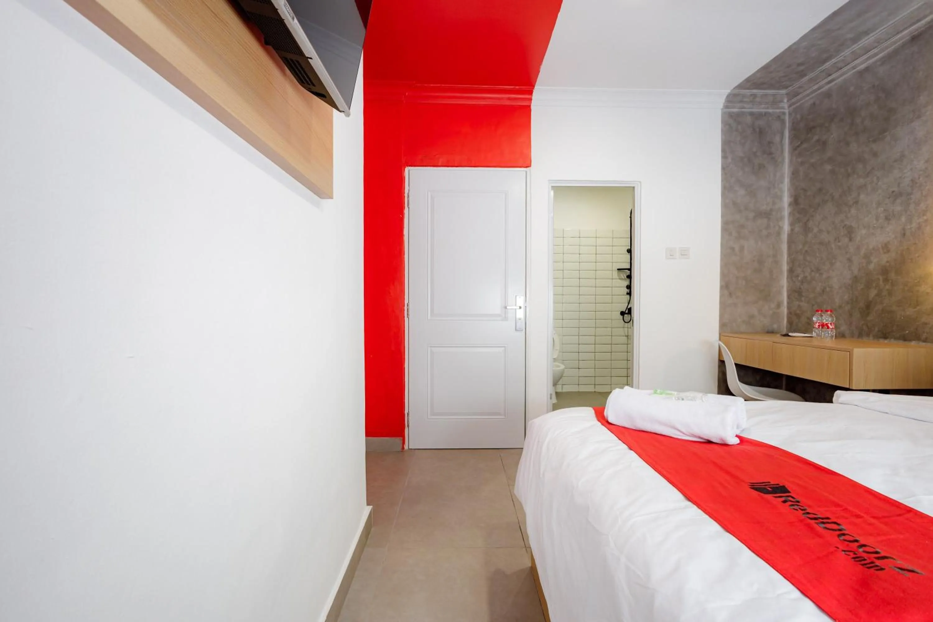 Bed in RedDoorz Plus at Jalan Gatot Subroto Jakarta