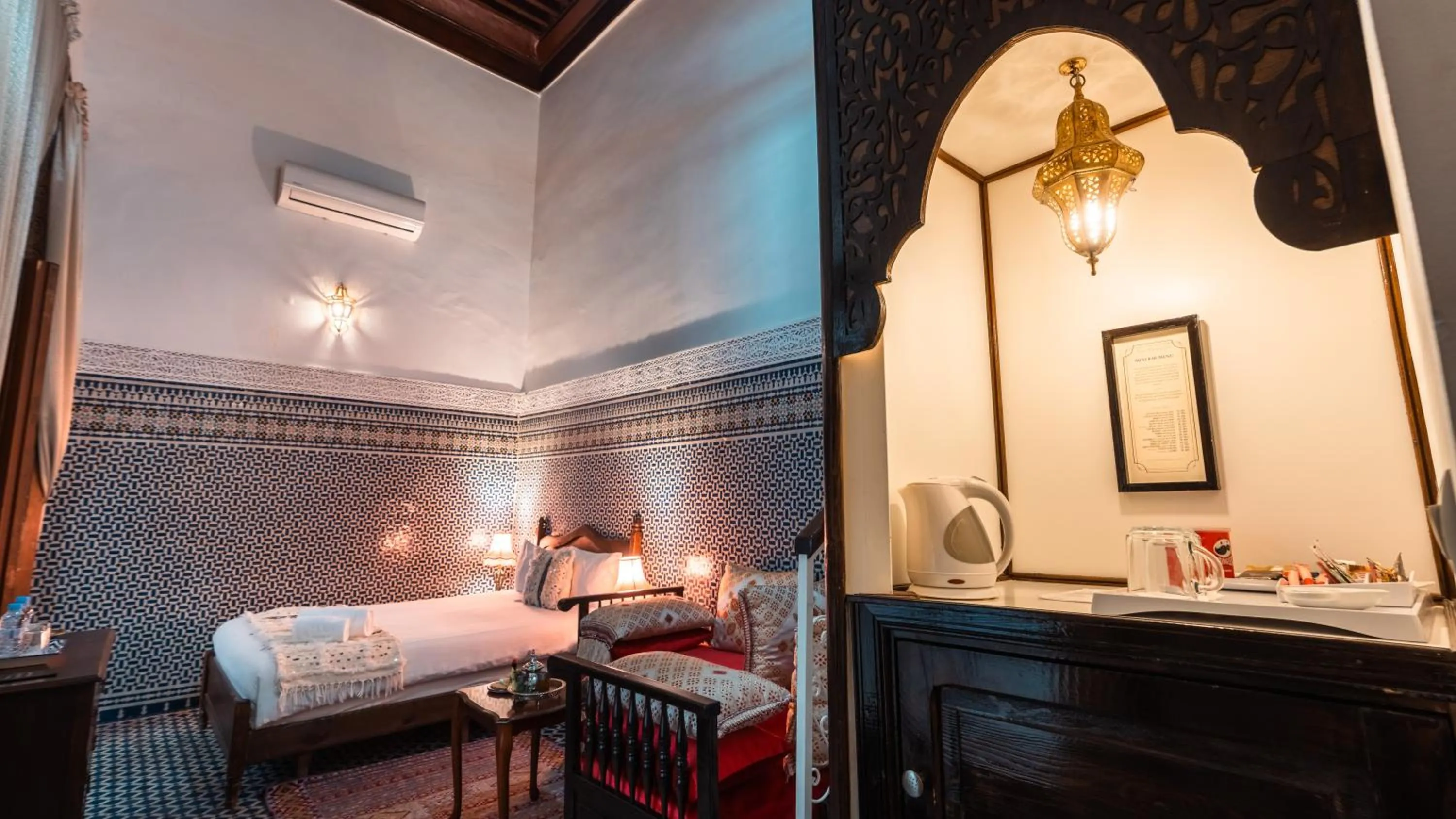 Bed in Riad Alassala Fes