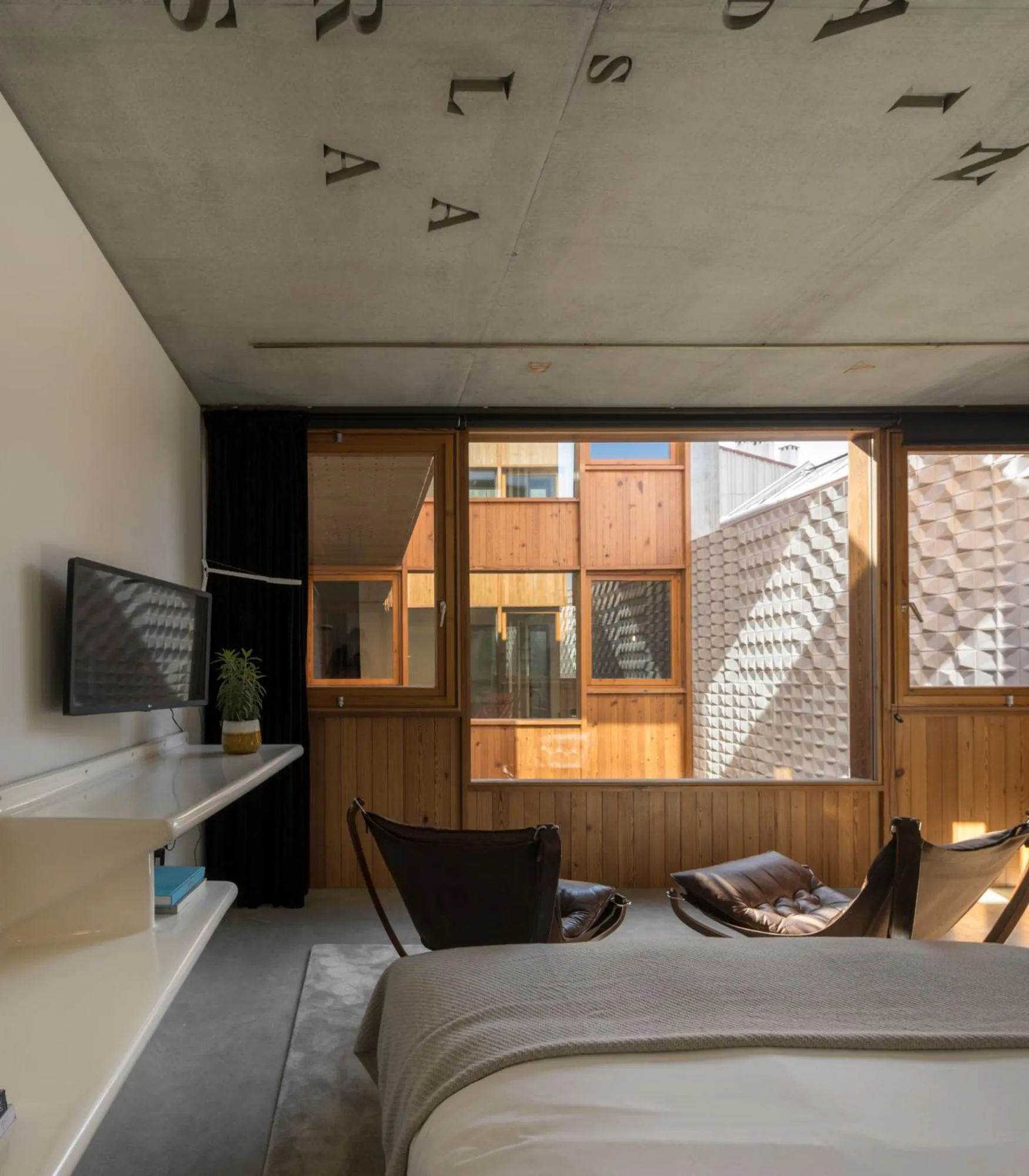 Bed in Hotel Tipografia do Conto by Casa do Conto