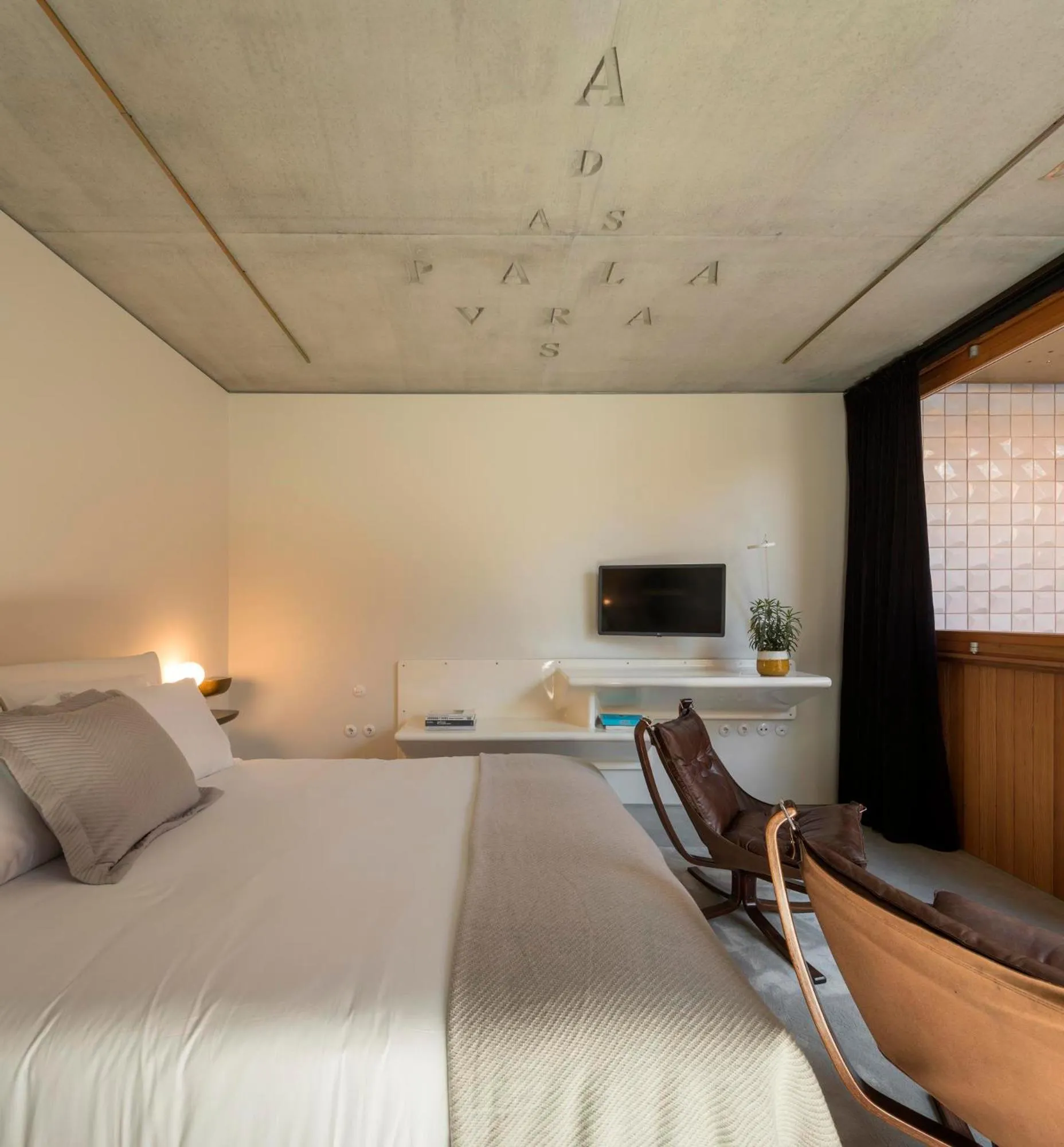 Bed in Hotel Tipografia do Conto by Casa do Conto