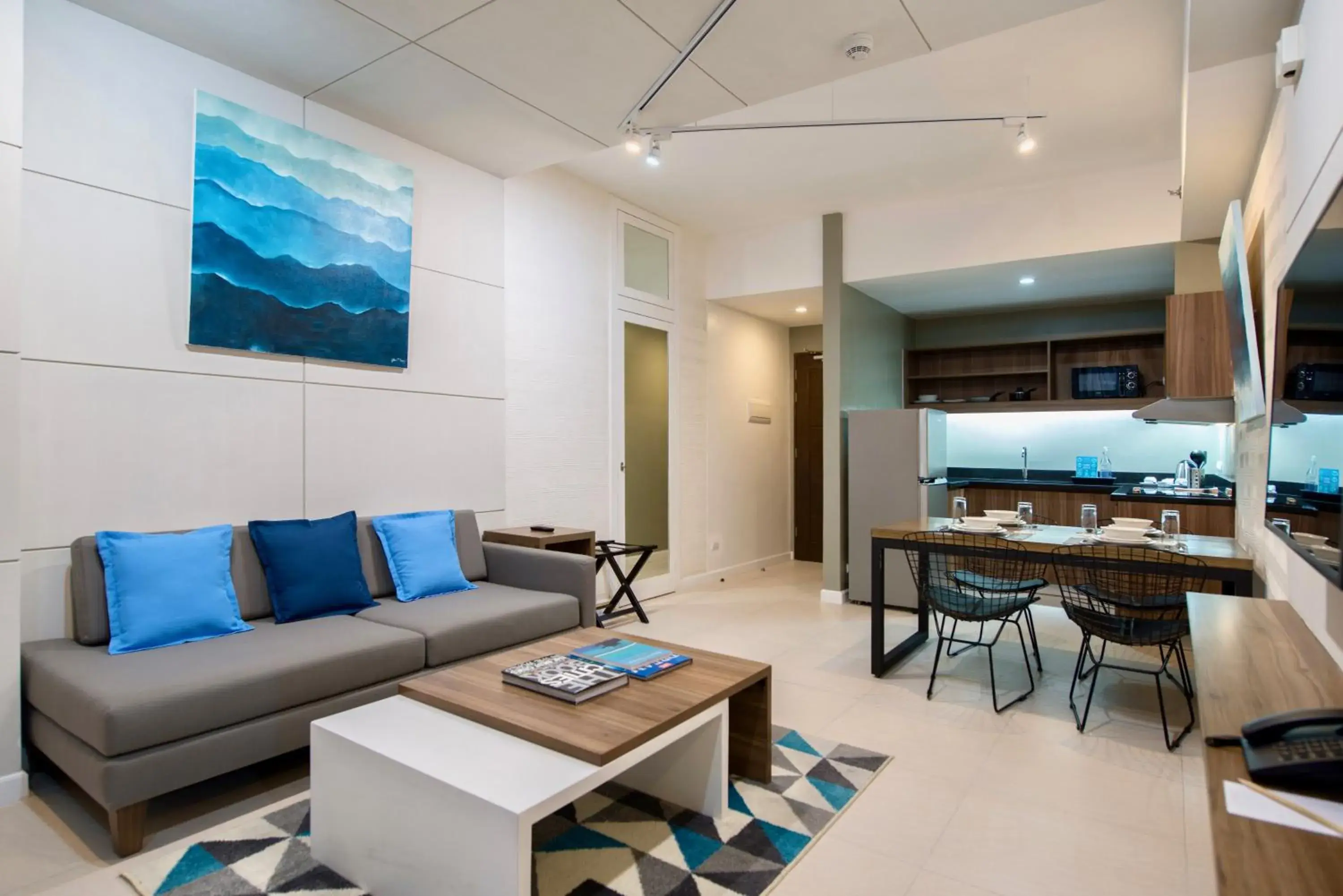 Living room in The Sphere Serviced Residences Managed by HII Living room in The Sphere Serviced Residences Managed by HII