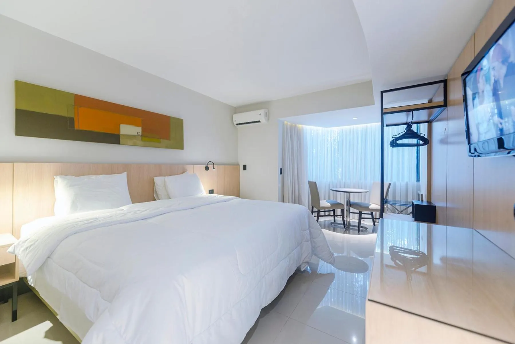 Bed in Rafain Palace Hotel & Convention Center