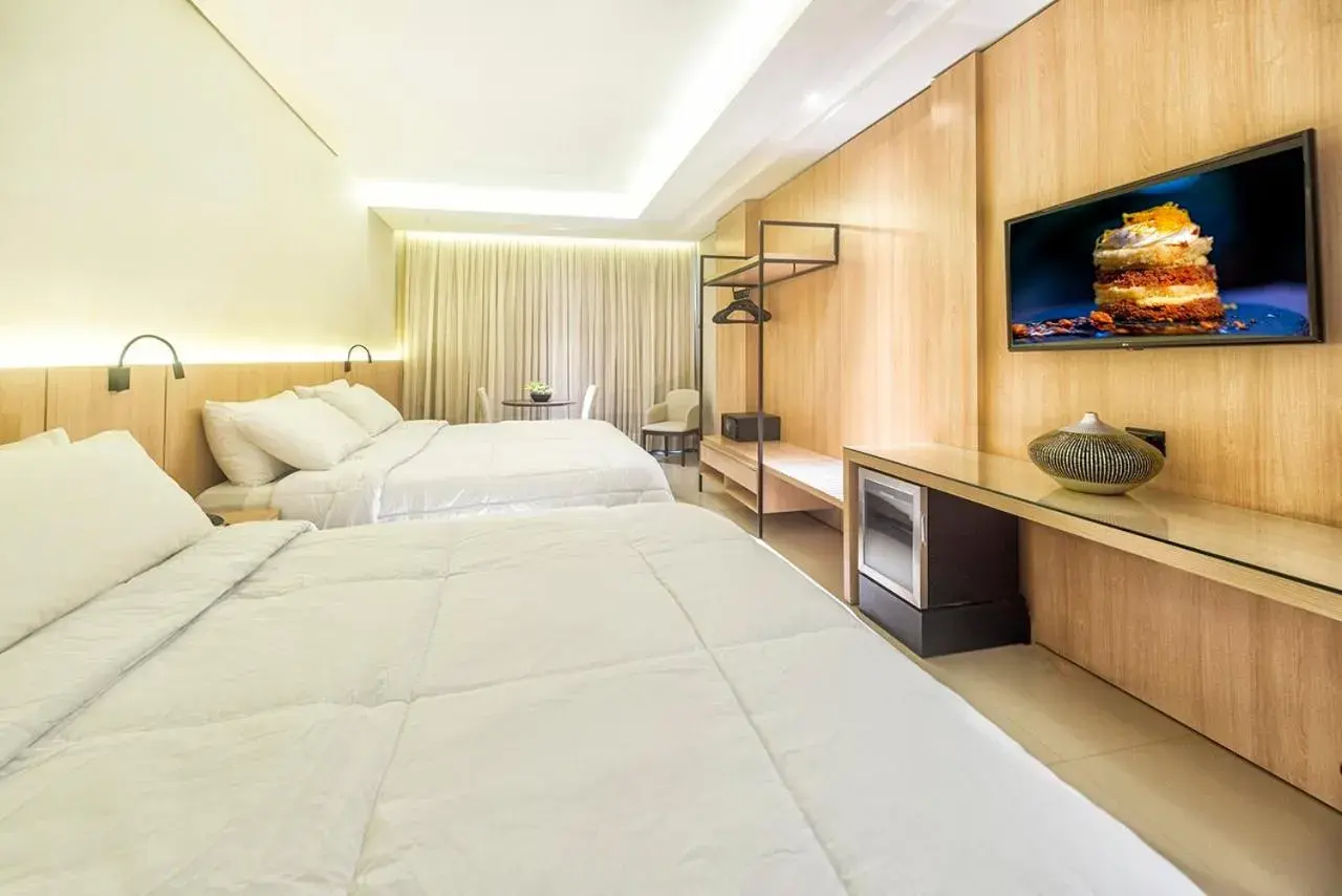 Bed in Rafain Palace Hotel & Convention Center Bed in Rafain Palace Hotel & Convention Center